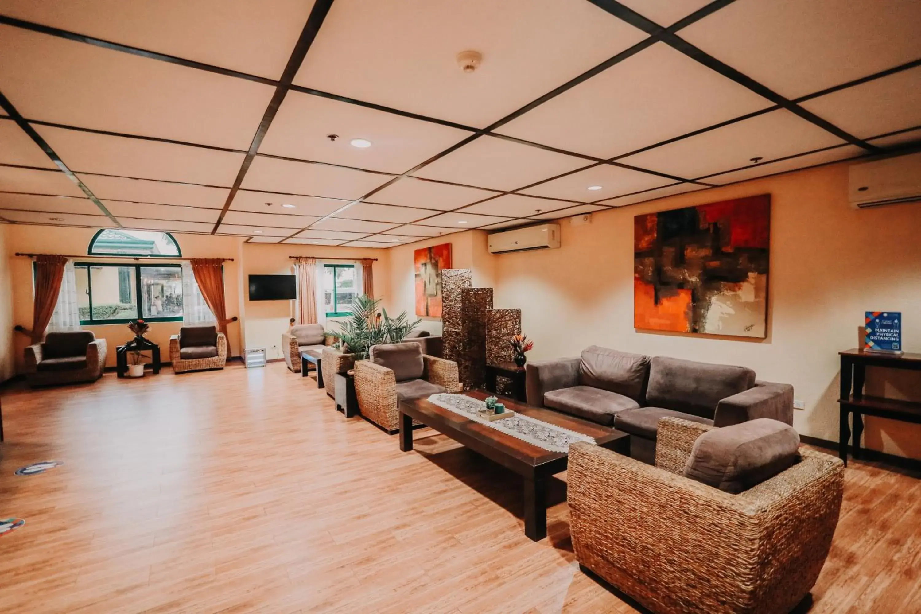 Lobby or reception in Microtel by Wyndham Cabanatuan Lobby or reception in Microtel by Wyndham Cabanatuan