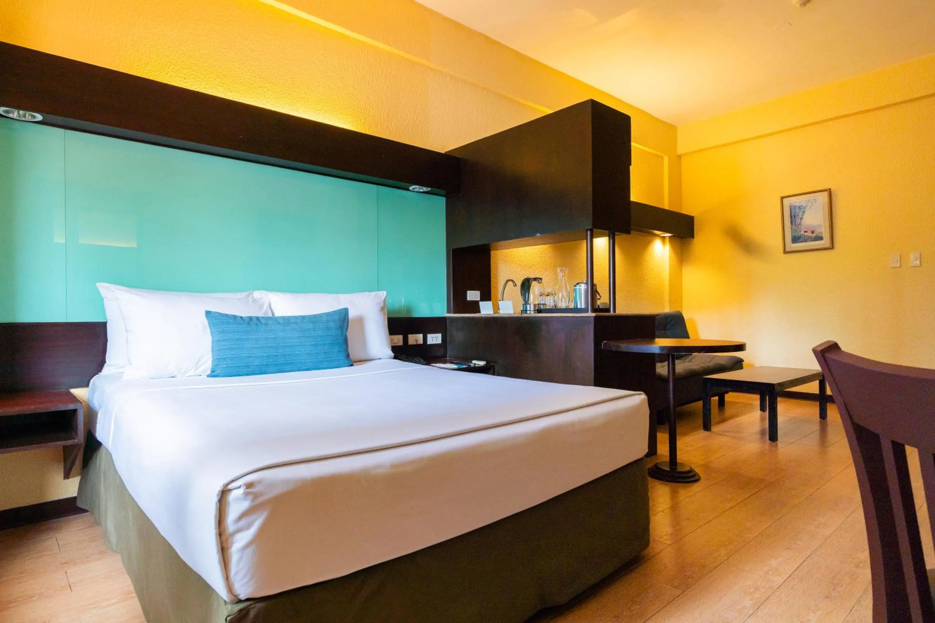 Bed in Microtel by Wyndham Cabanatuan