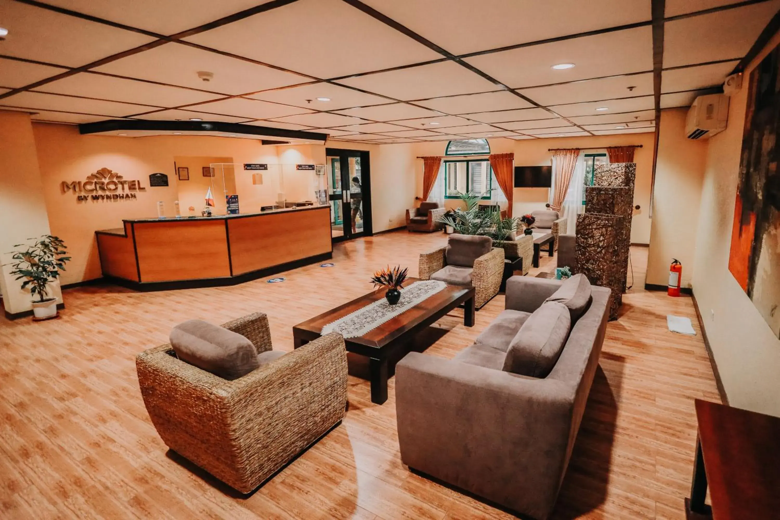 Lobby or reception in Microtel by Wyndham Cabanatuan Lobby or reception in Microtel by Wyndham Cabanatuan