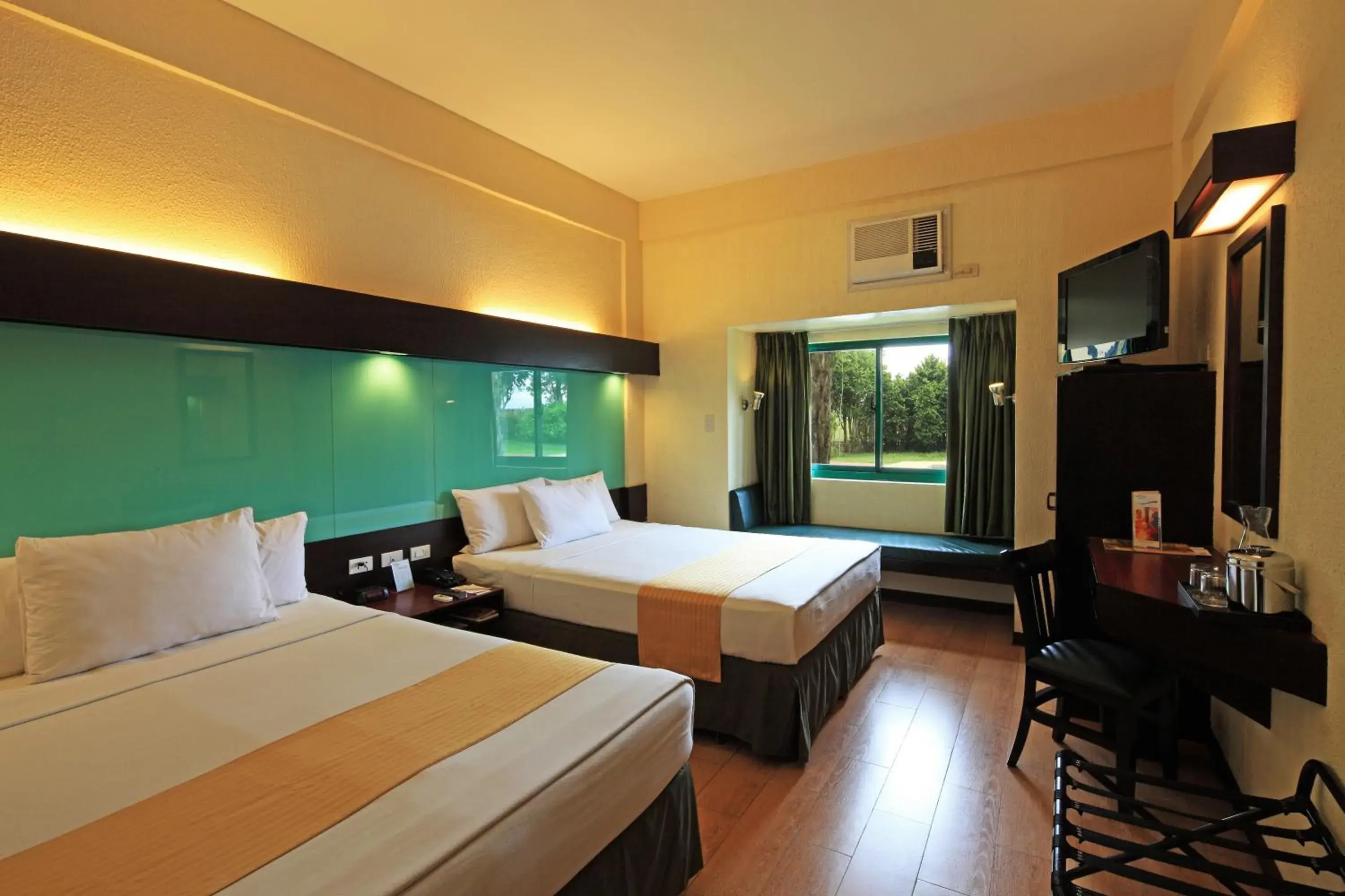 Photo of the whole room, Bed in Microtel by Wyndham Cabanatuan Photo of the whole room, Bed in Microtel by Wyndham Cabanatuan