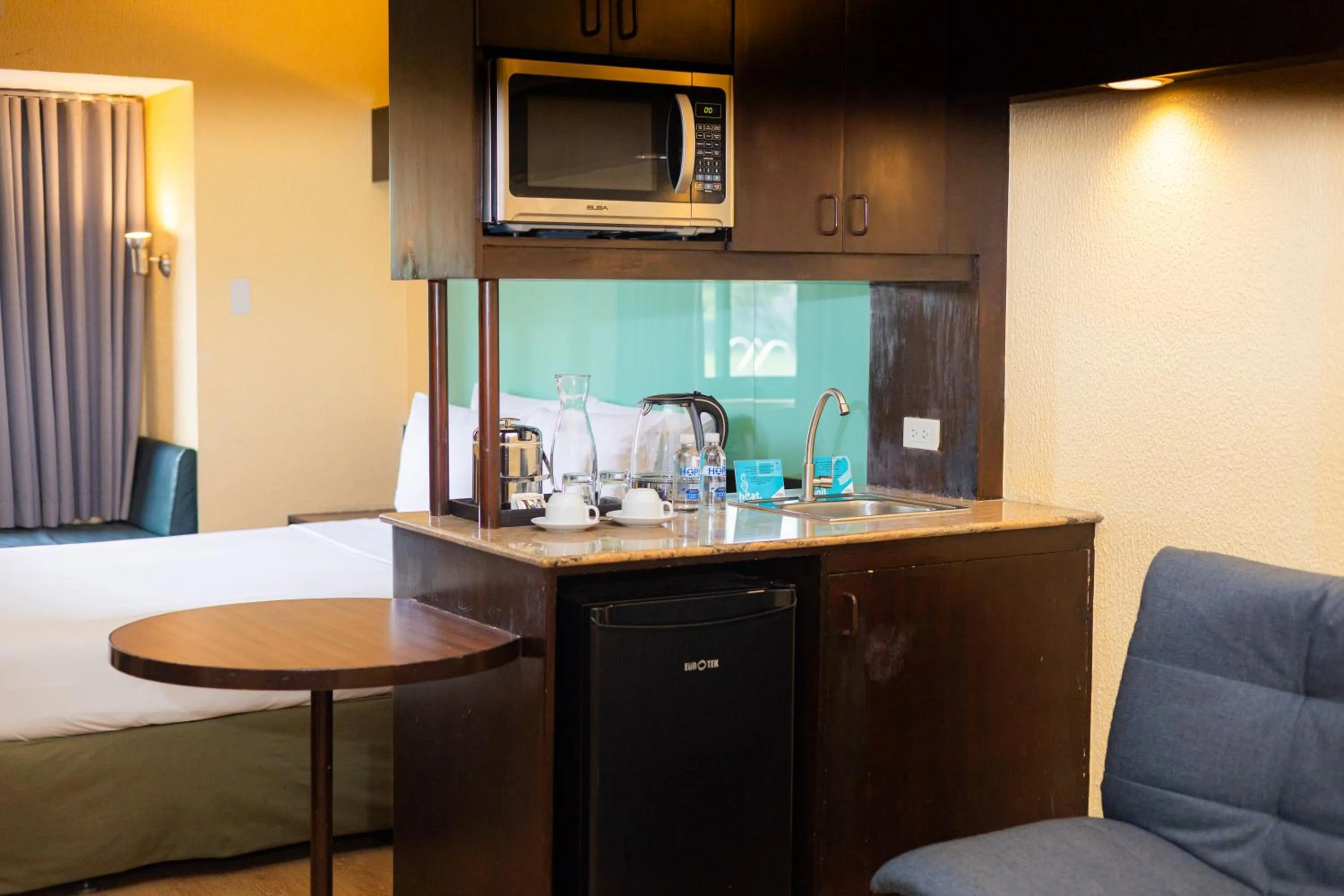 Kitchen or kitchenette in Microtel by Wyndham Cabanatuan