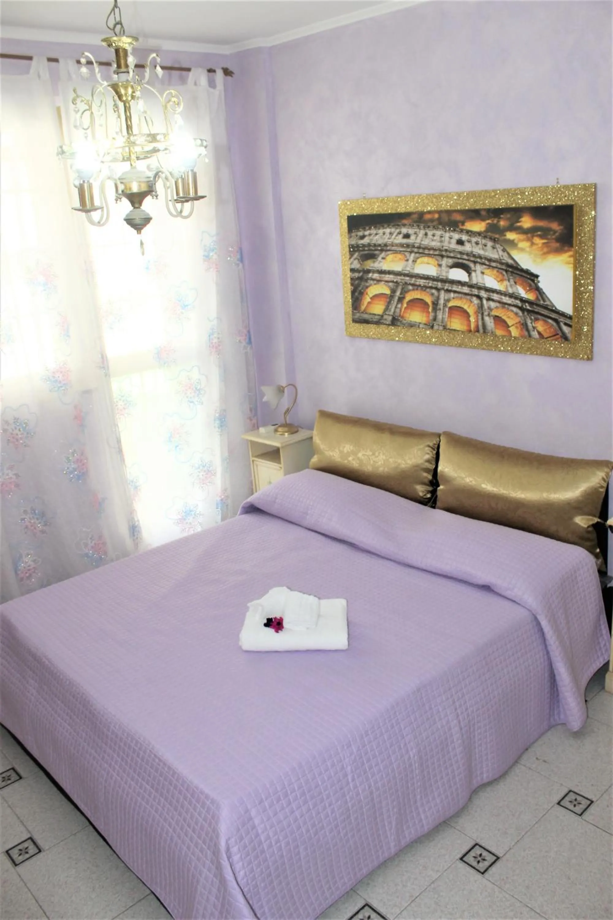 Bed in San Peter's Golden Rooms