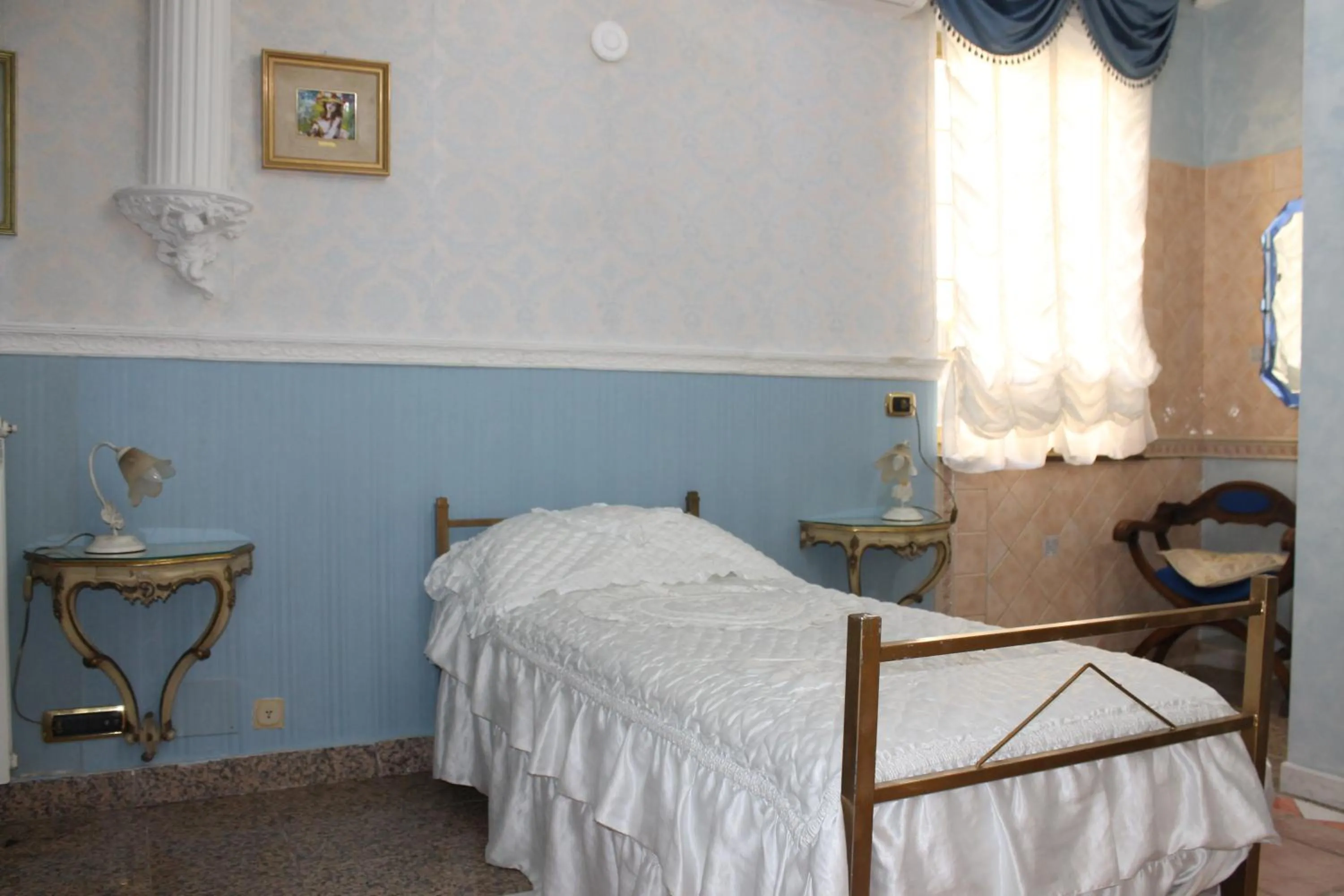 Bed in San Peter's Golden Rooms
