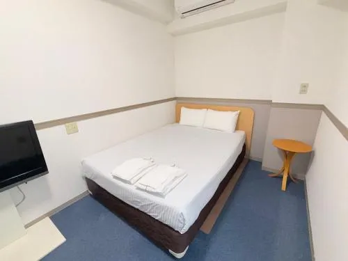 Bed in Business Hotel Legato