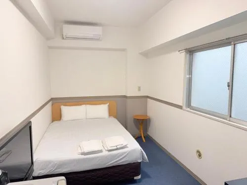 Bed in Business Hotel Legato