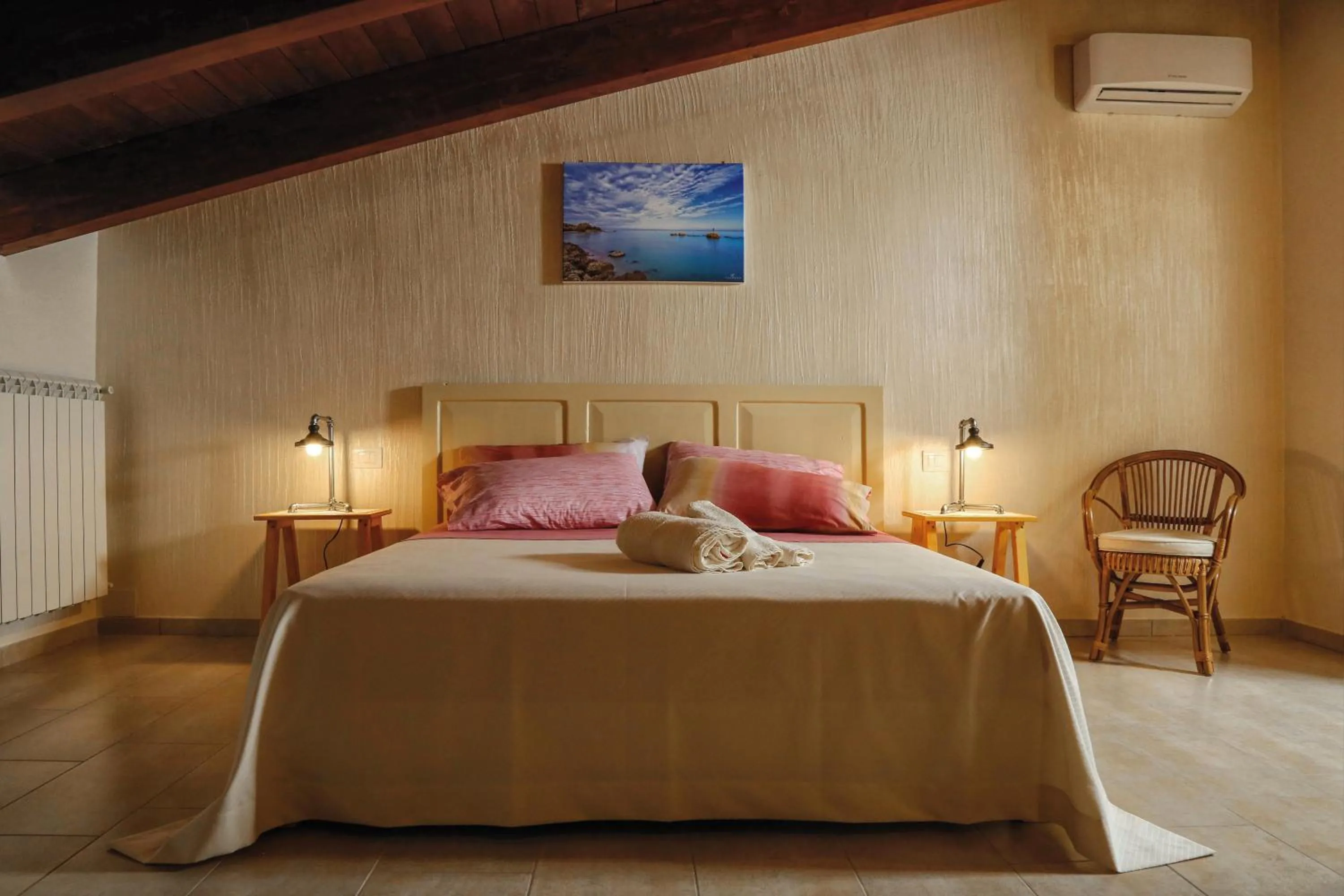 Bed in Le mansardine