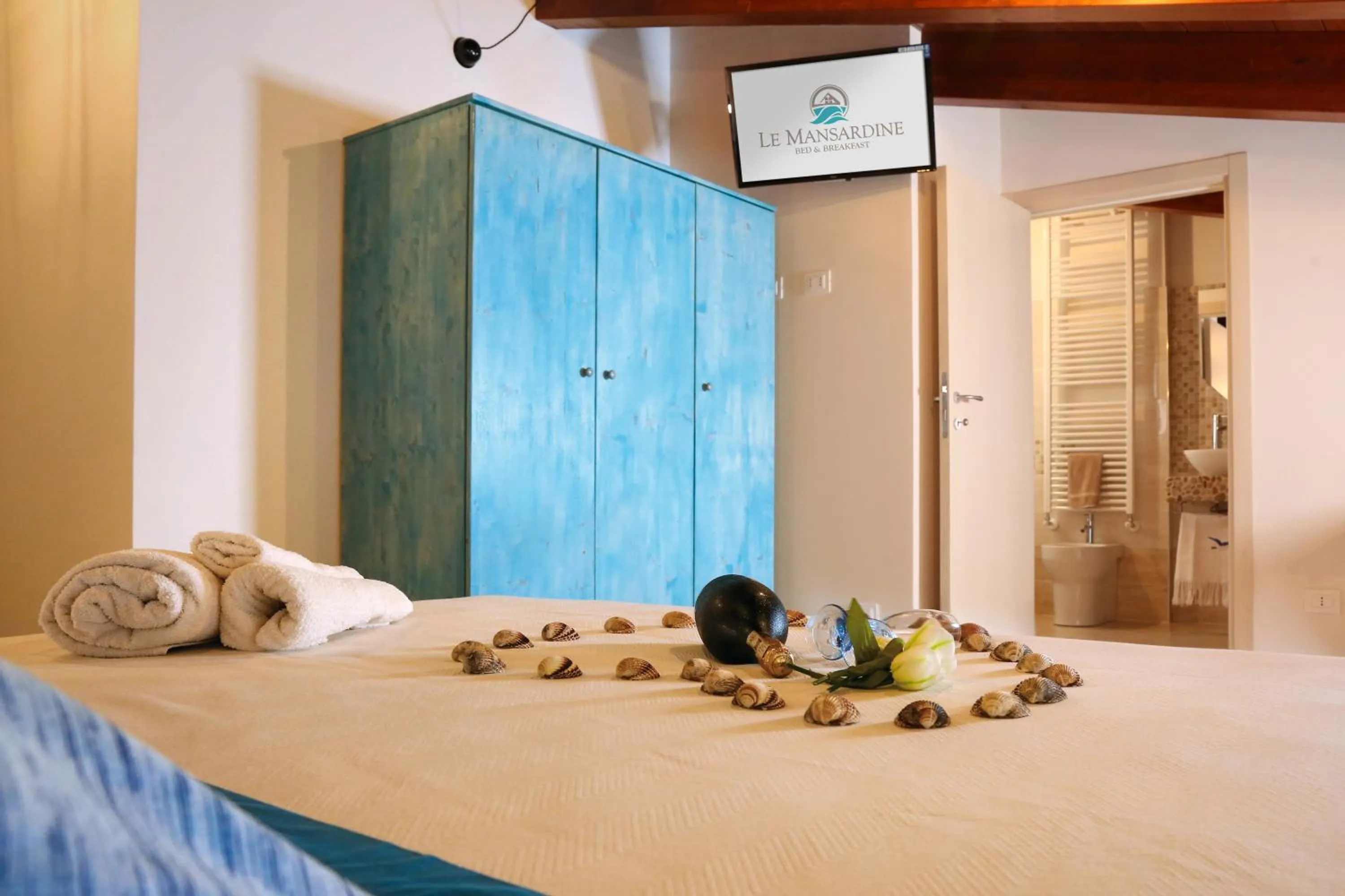 Bed in Le mansardine