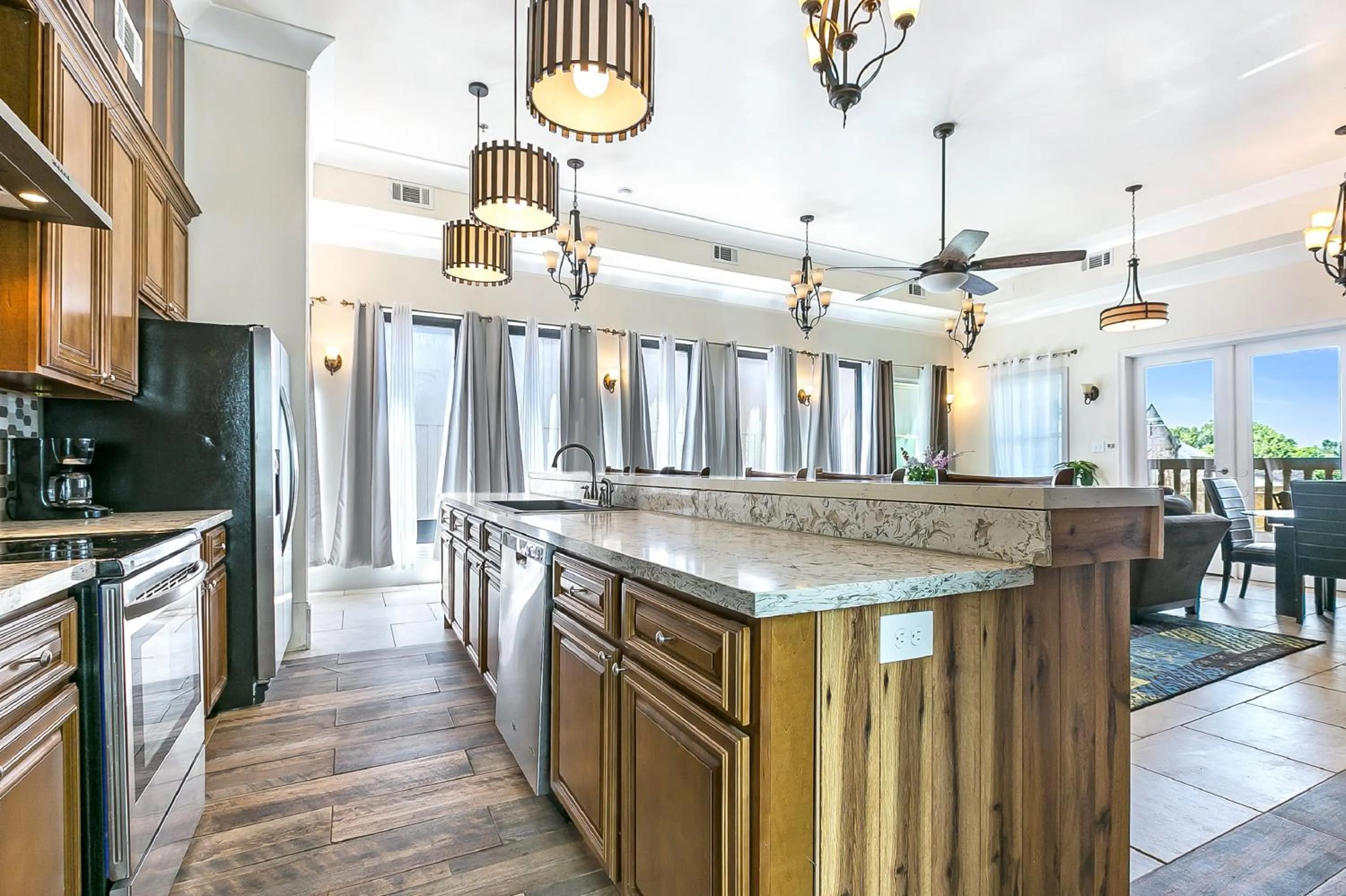 Kitchen or kitchenette in Urban Condos with Spacious Rooms & Amenities