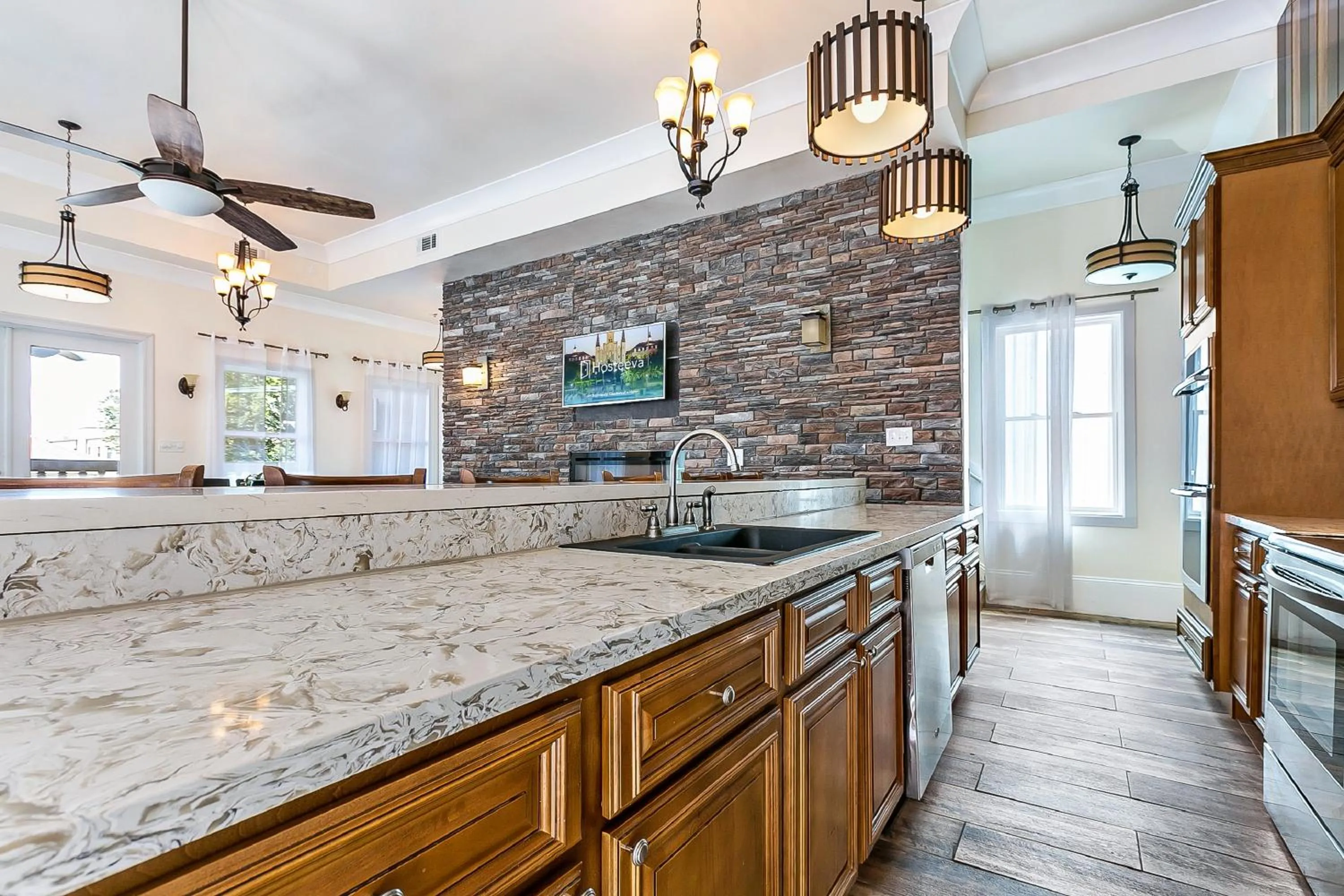 Kitchen or kitchenette in Urban Condos with Spacious Rooms & Amenities