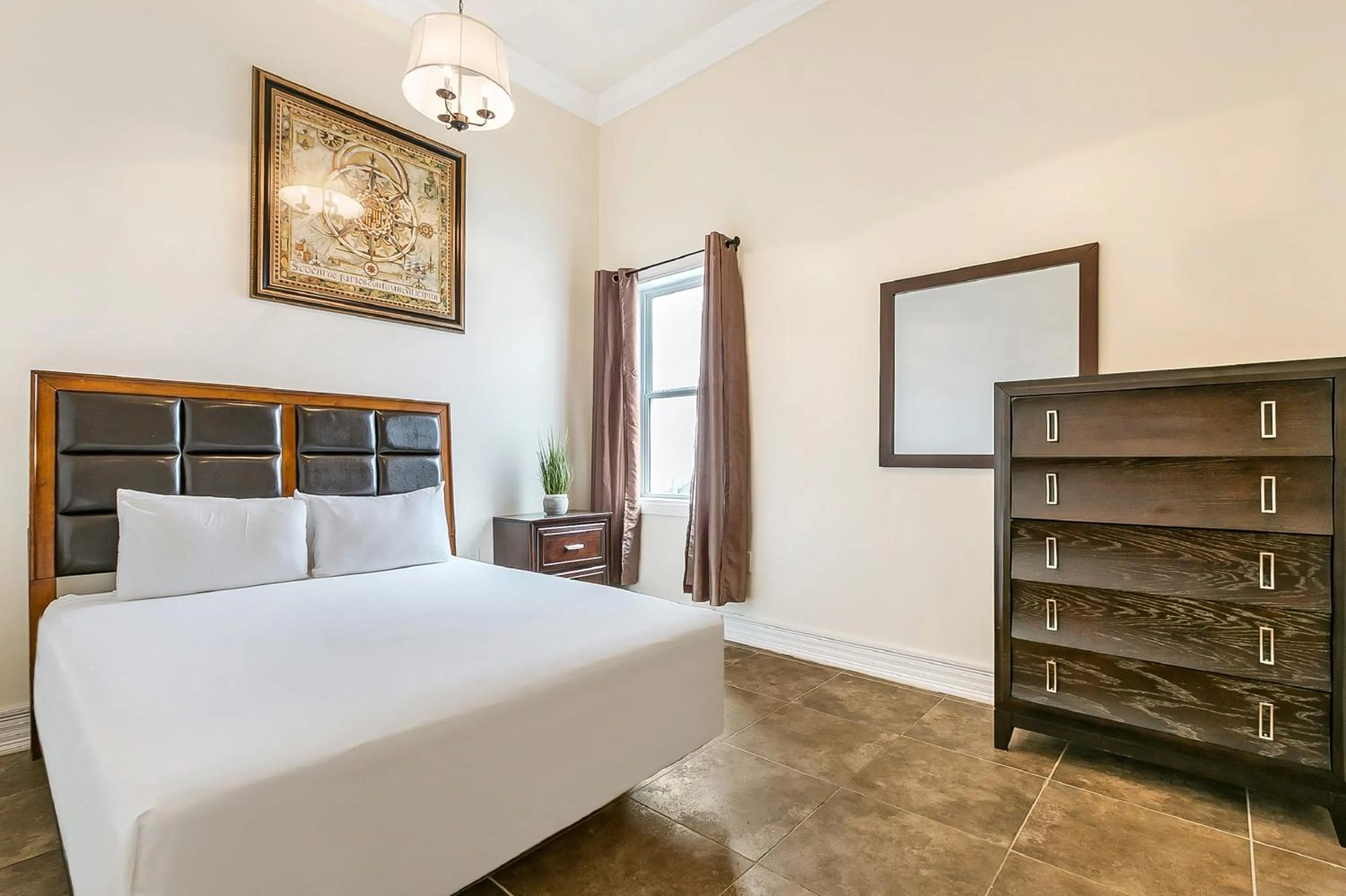 Bedroom, Bed in Urban Condos with Spacious Rooms & Amenities