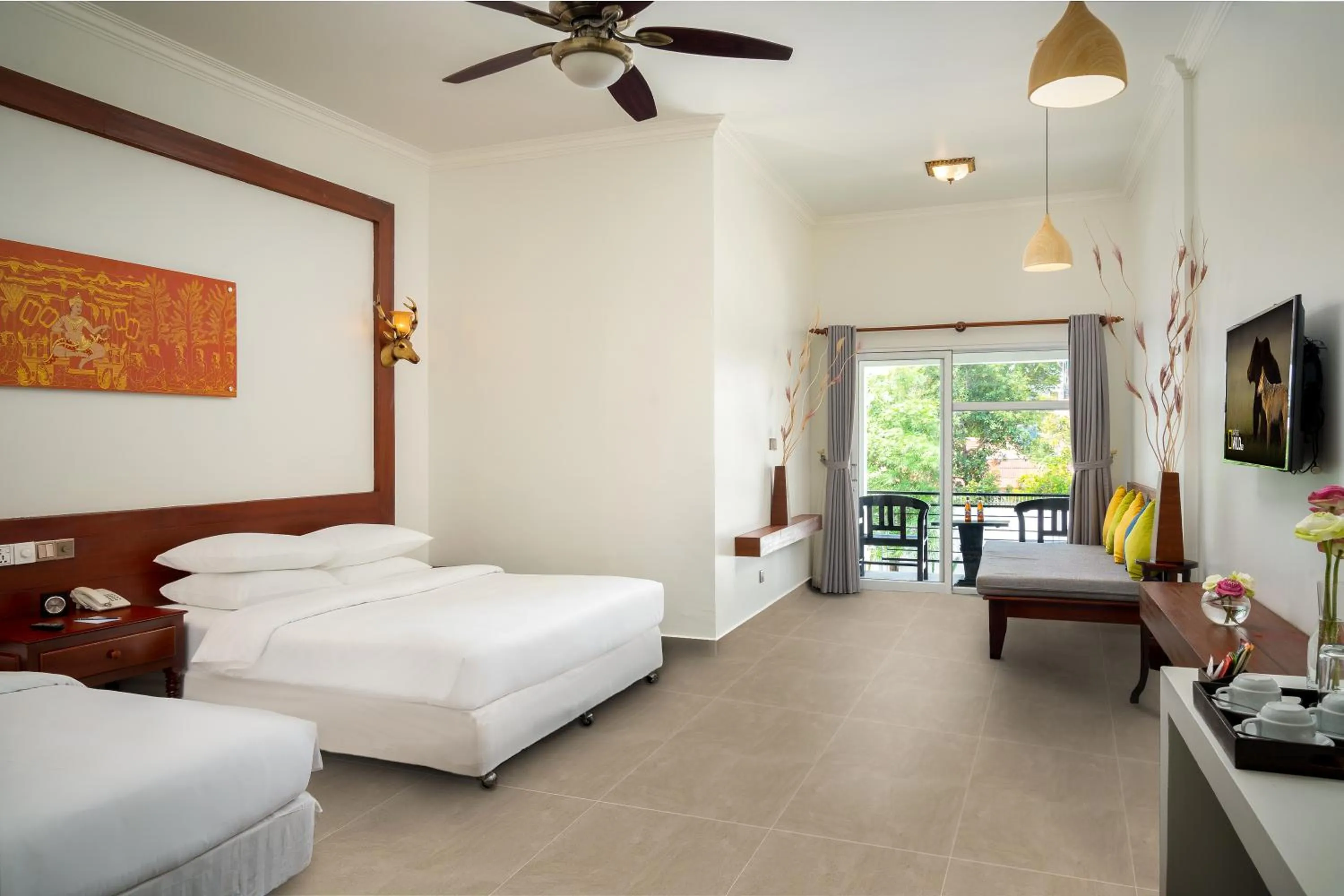 Communal lounge/ TV room, Bed in Sala Siem Reap Hotel