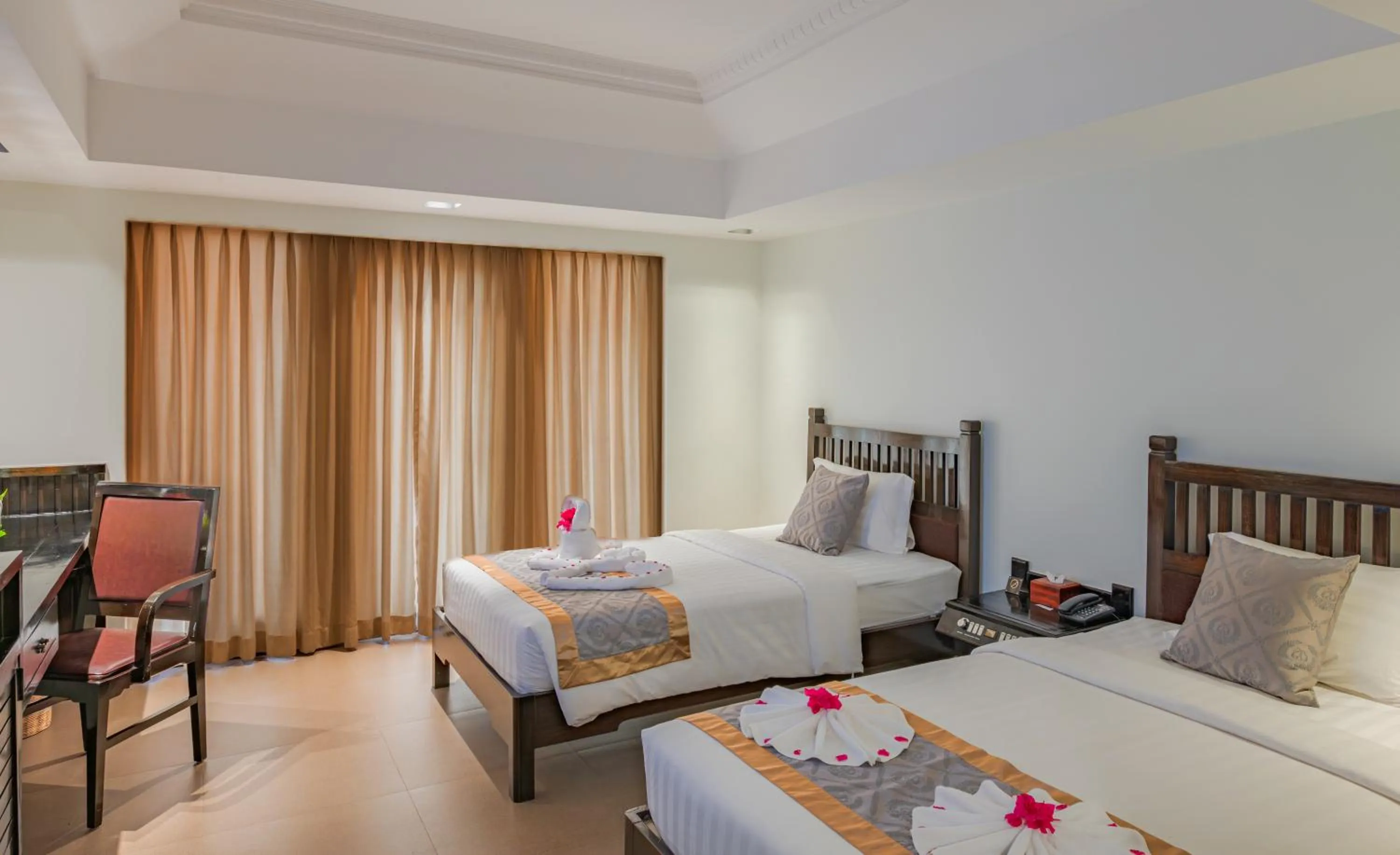 Bed in Sokchea Angkor Hotel