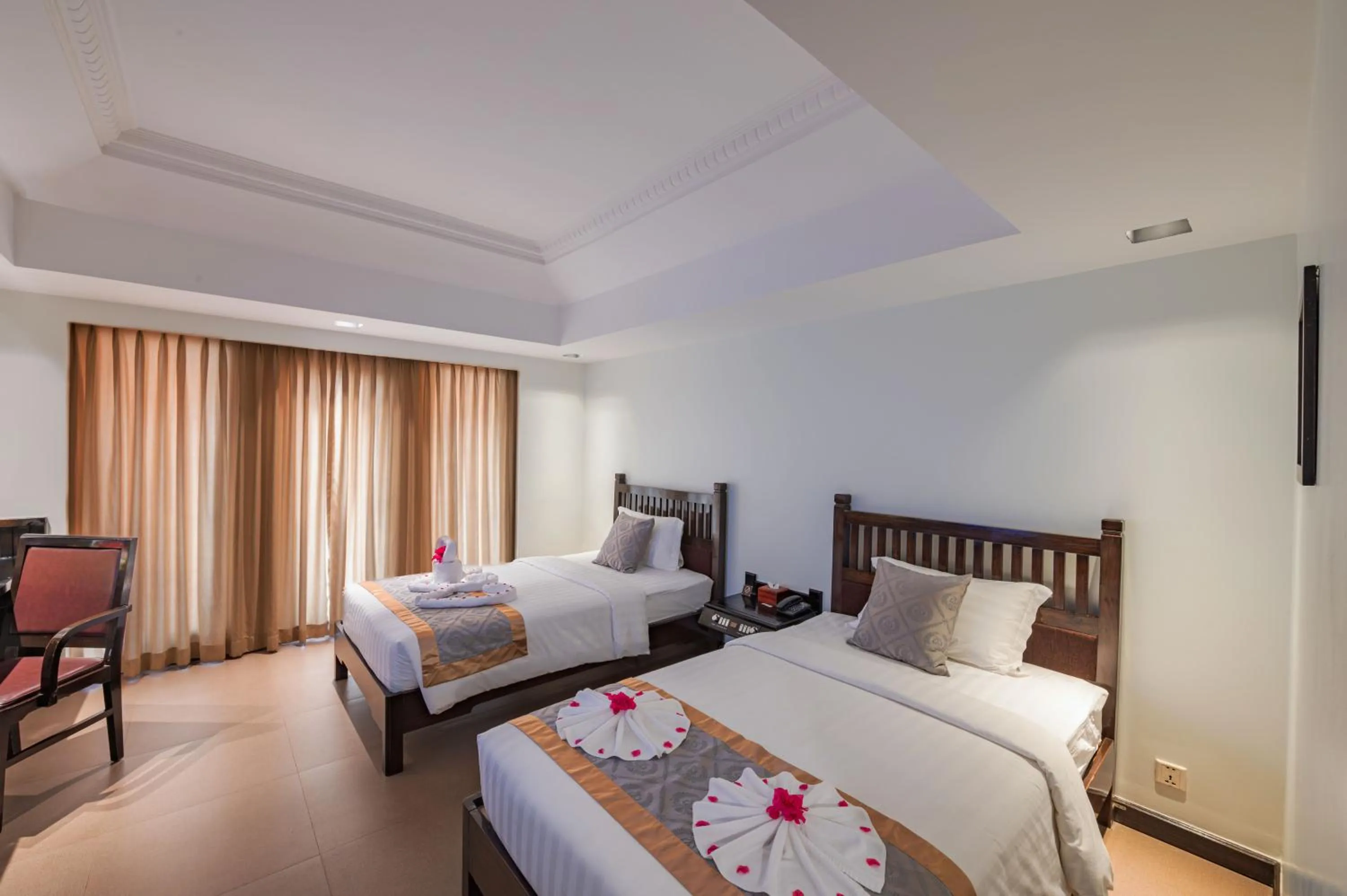 Photo of the whole room, Bed in Sokchea Angkor Hotel