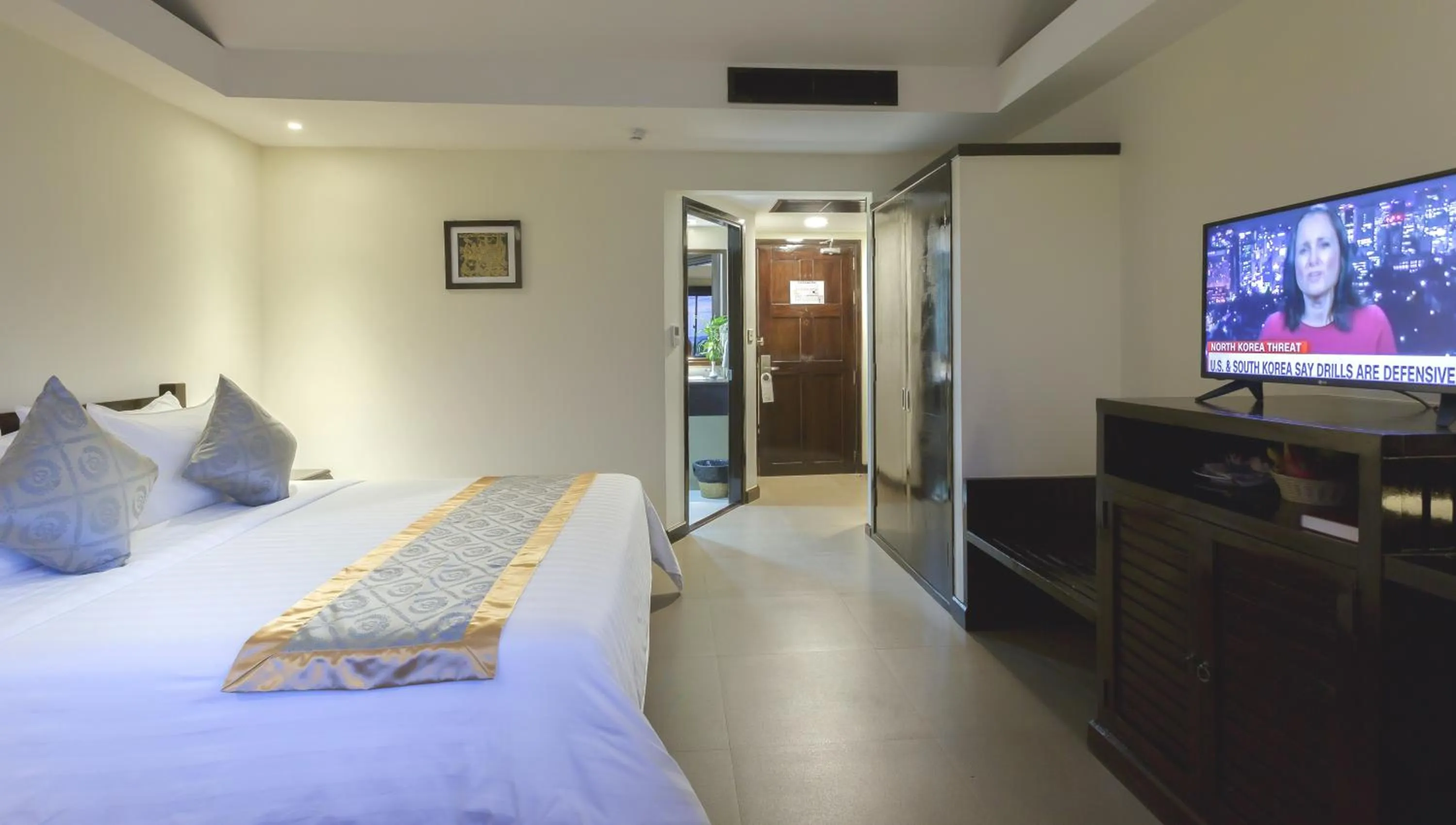 Bed in Sokchea Angkor Hotel