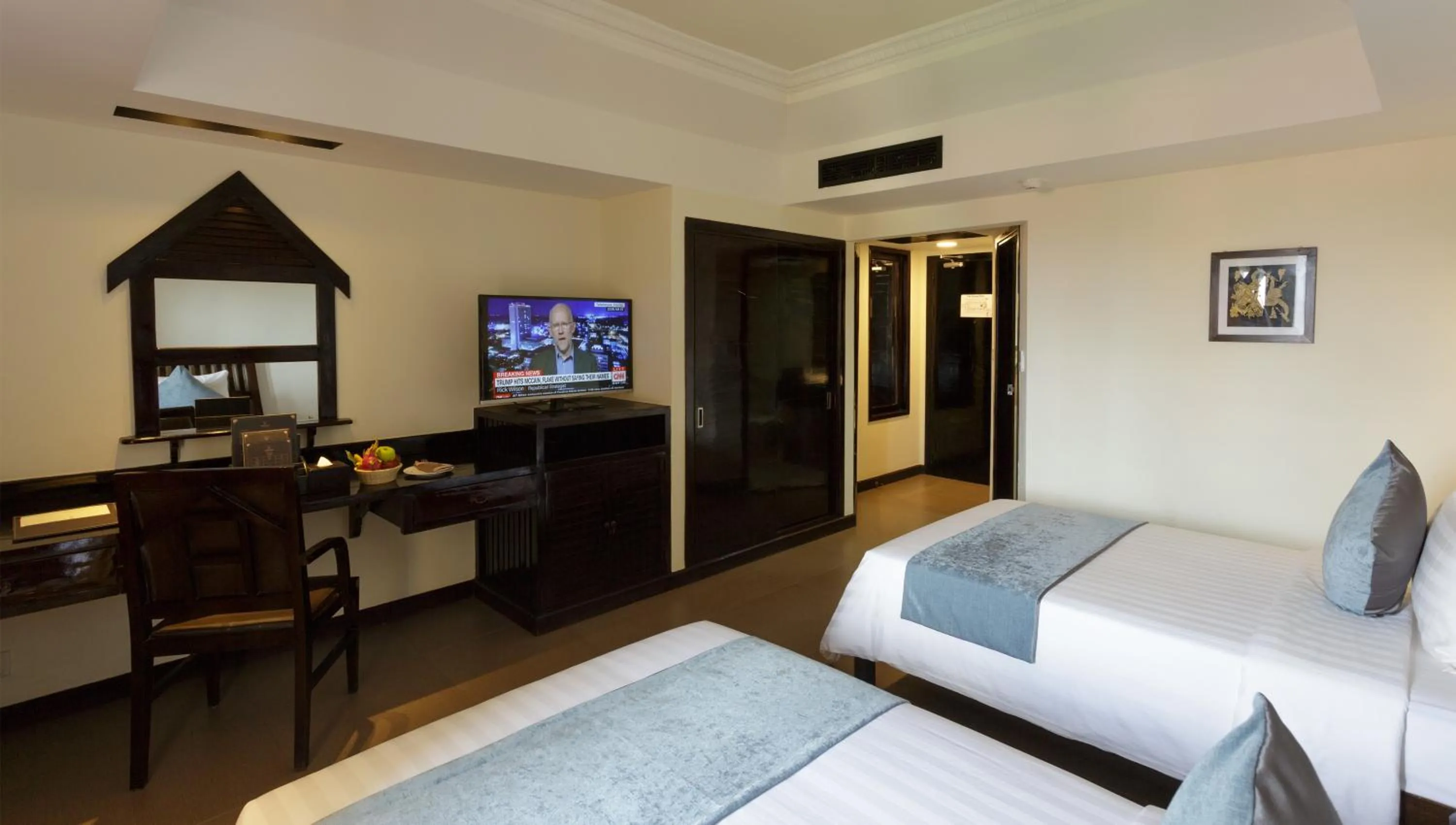 Communal lounge/ TV room, Bed in Sokchea Angkor Hotel