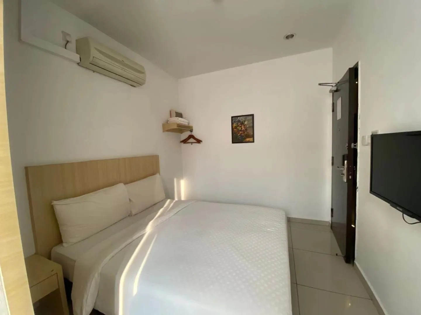 Bed in Swan Garden Hotel