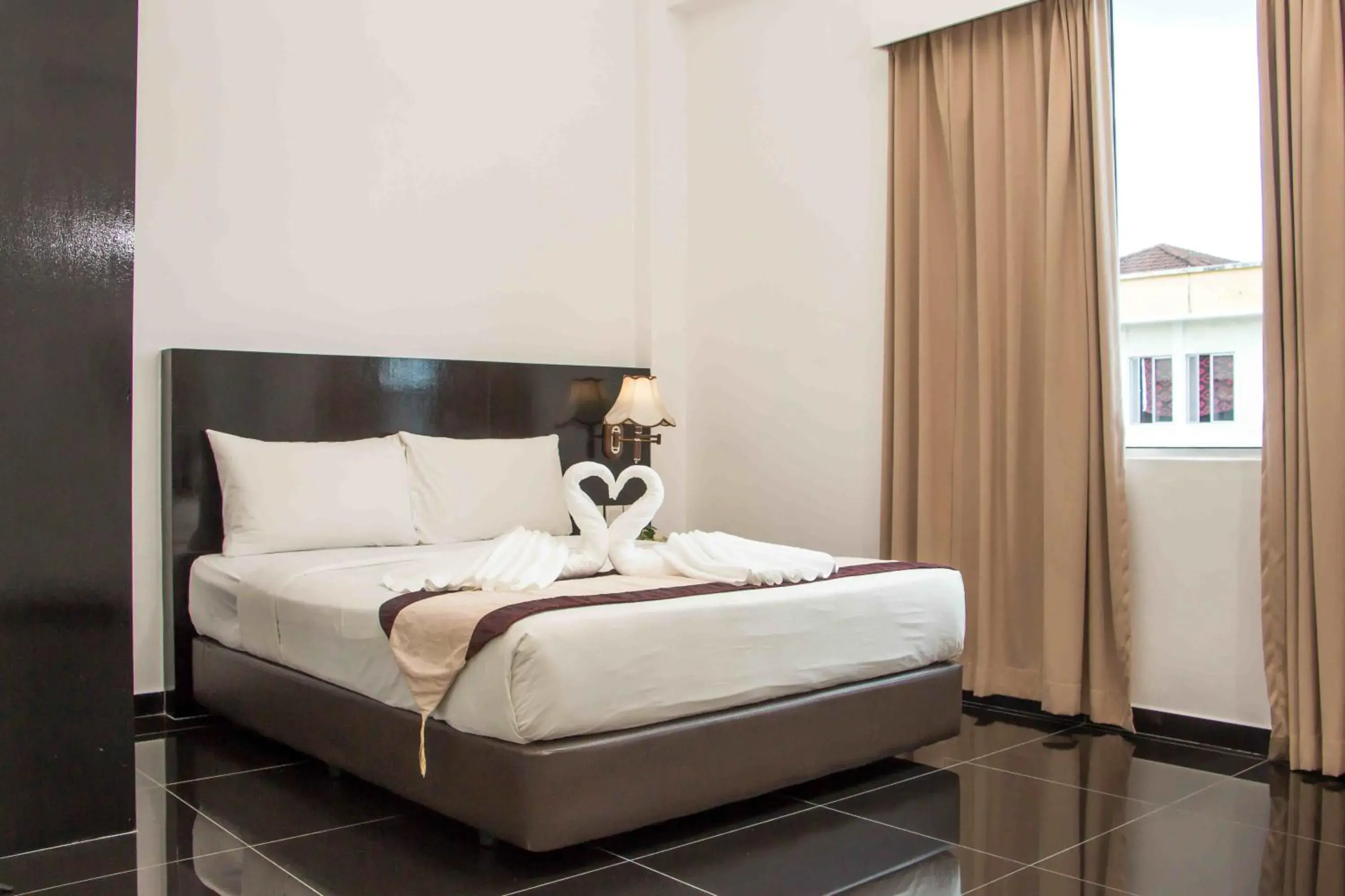 Bed in Swan Garden Hotel Bed in Swan Garden Hotel