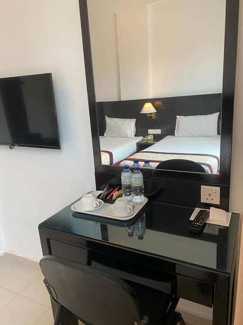 Bed in Swan Garden Hotel