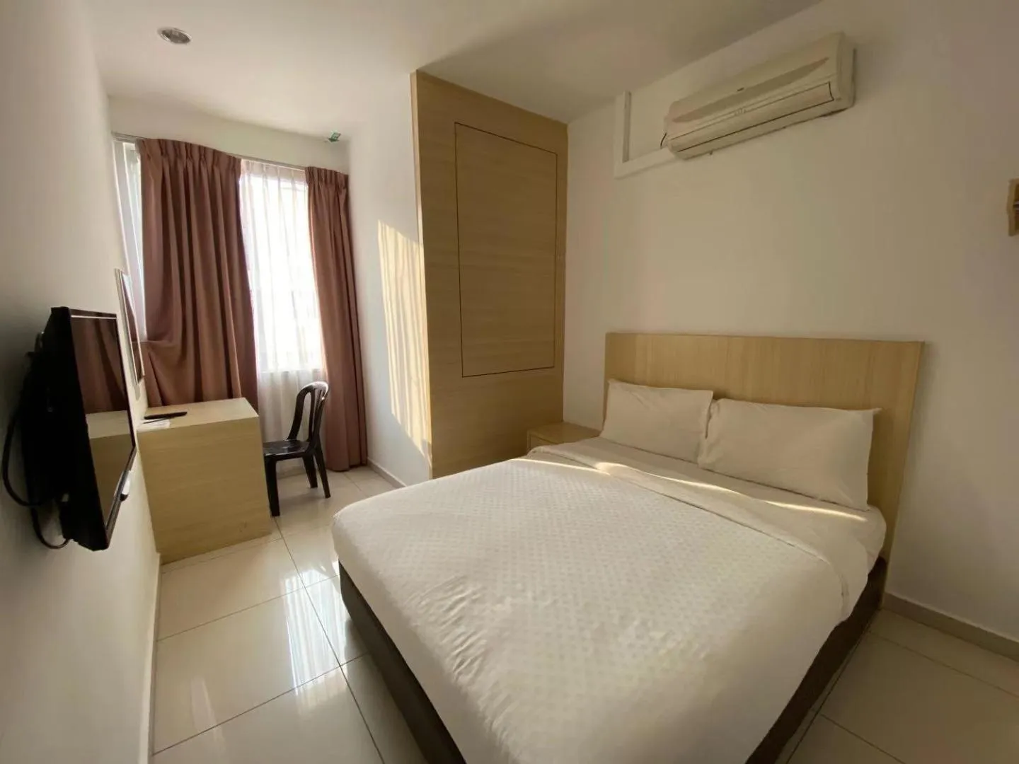 Bed in Swan Garden Hotel