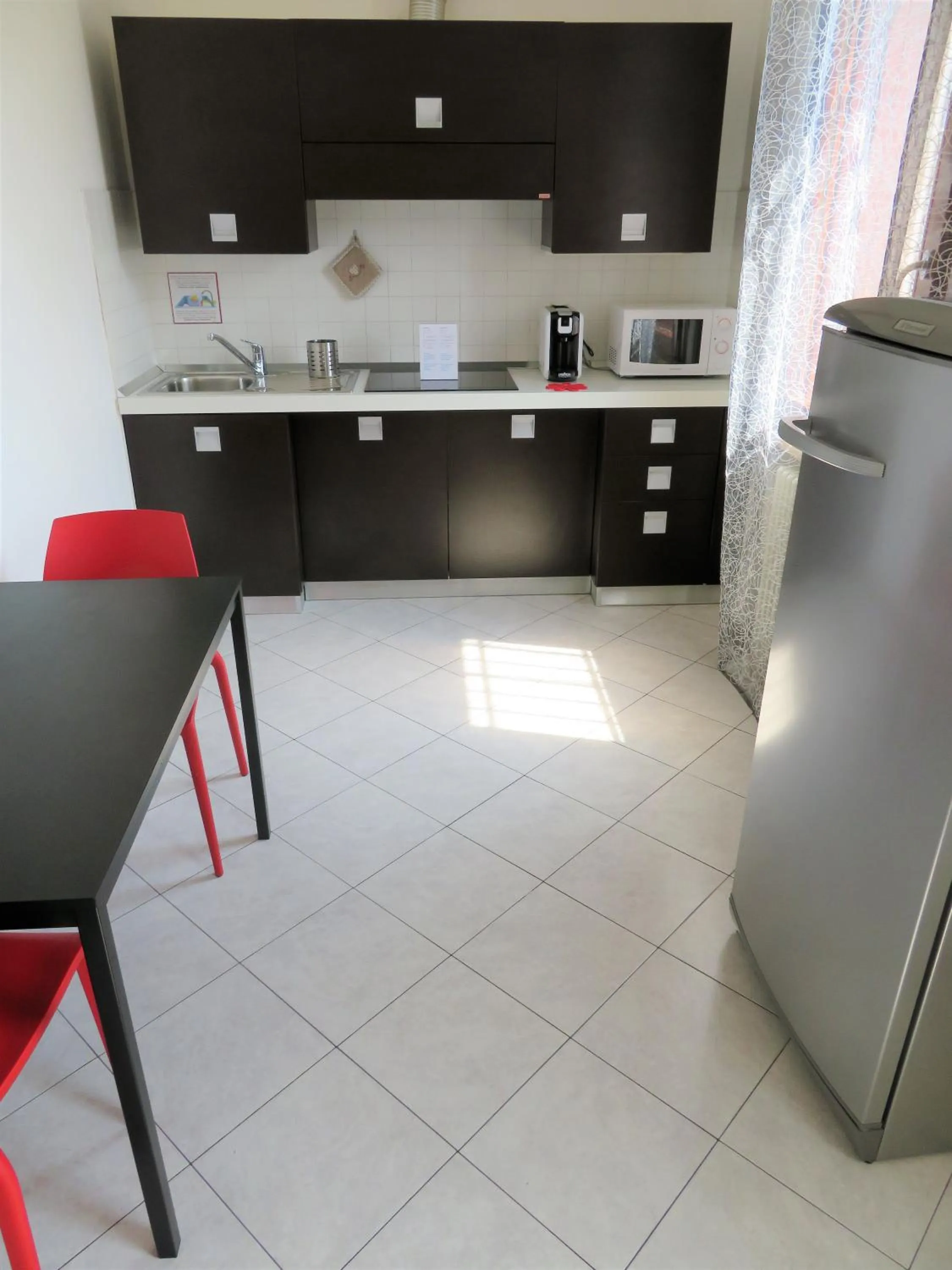 Dining area in Verona Class ApartHotel "Residenze del Cuore"