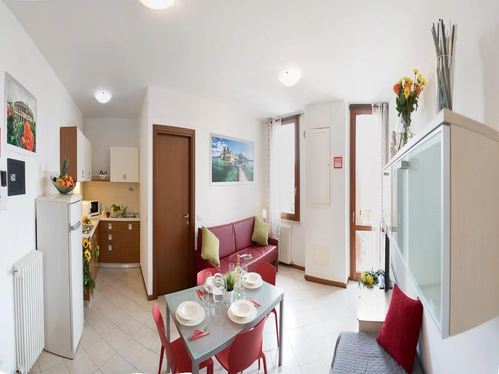 Kitchen or kitchenette in Verona Class ApartHotel "Residenze del Cuore"