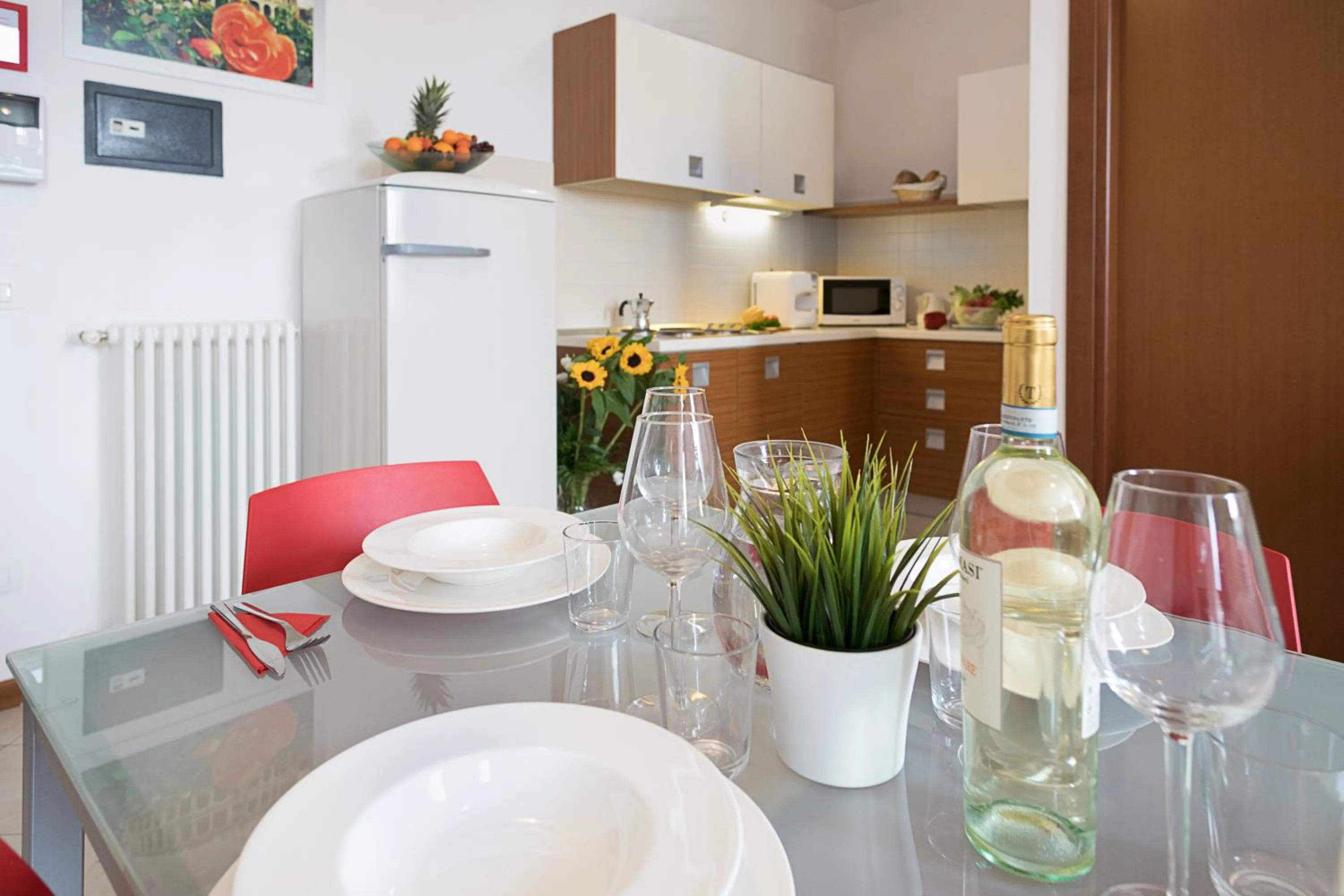 Kitchen or kitchenette in Verona Class ApartHotel "Residenze del Cuore"