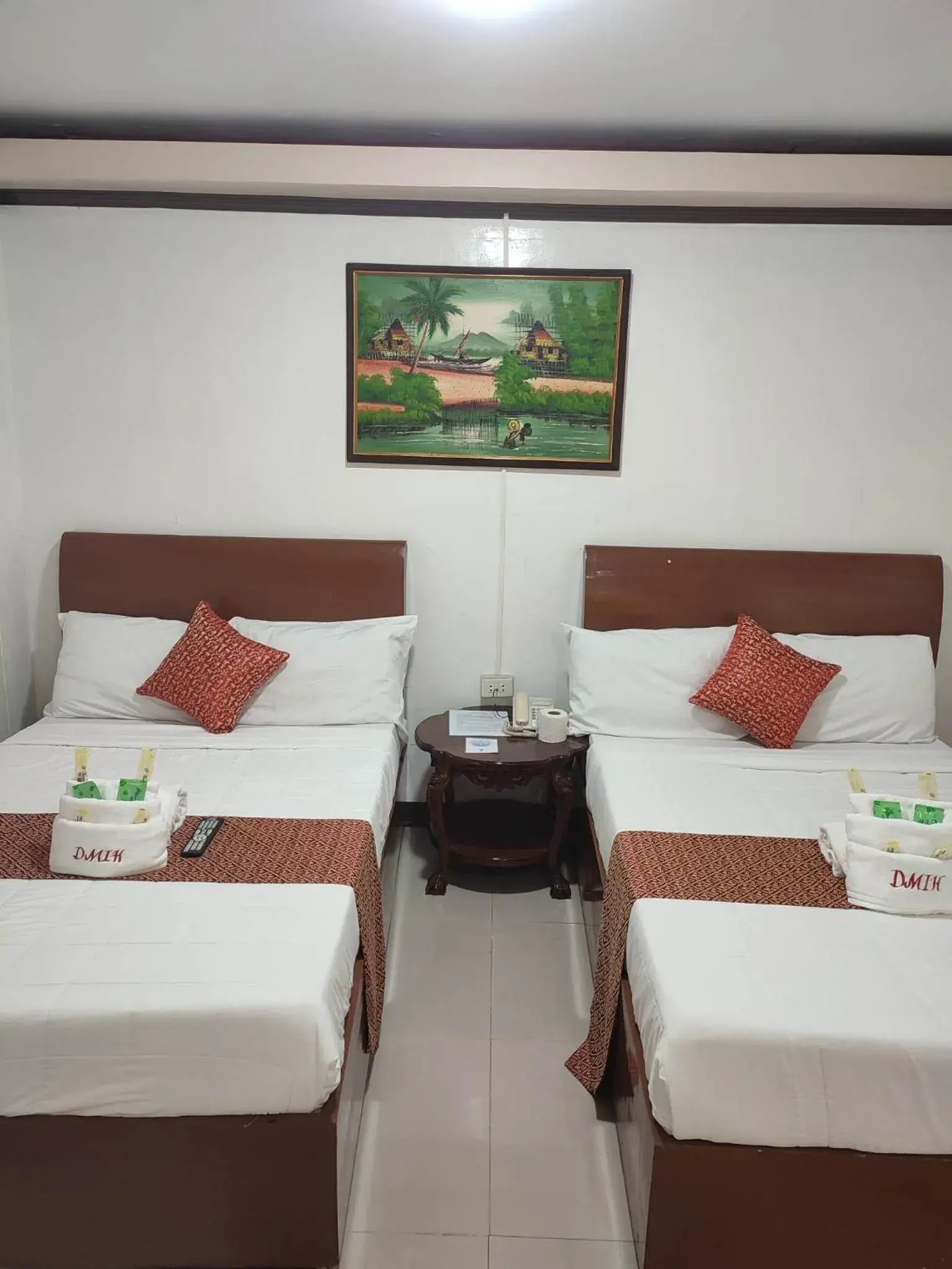 Bed in D'Mariners Inn Hotel Bed in D'Mariners Inn Hotel