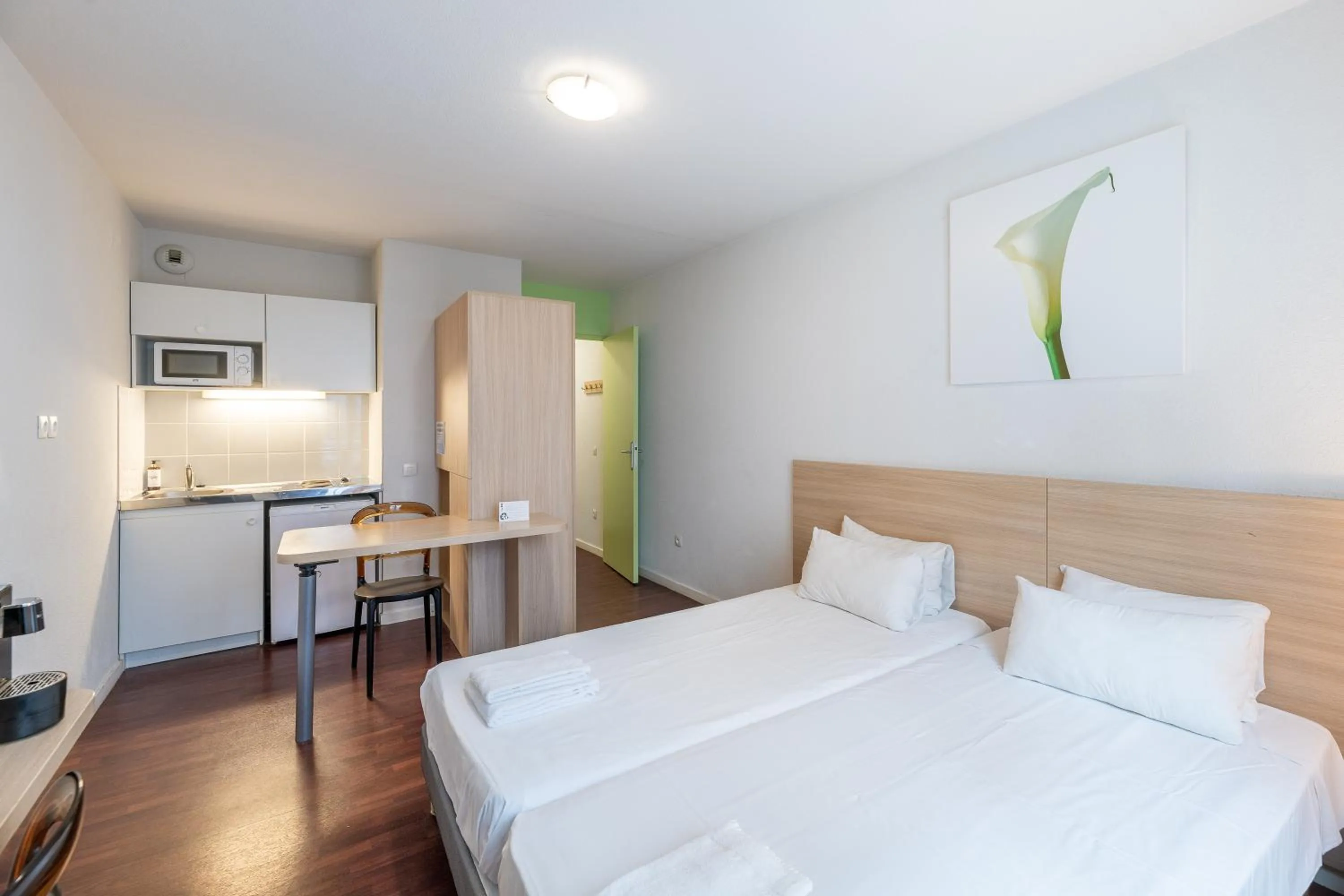 Photo of the whole room, Bed in Residhotel St Etienne Centre