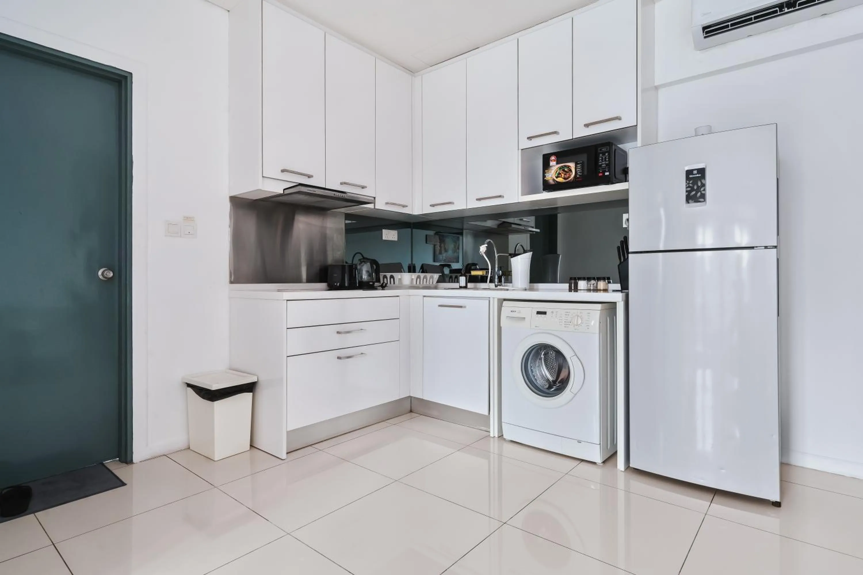 kitchen in Summer Suites KLCC Apartments by soulasia