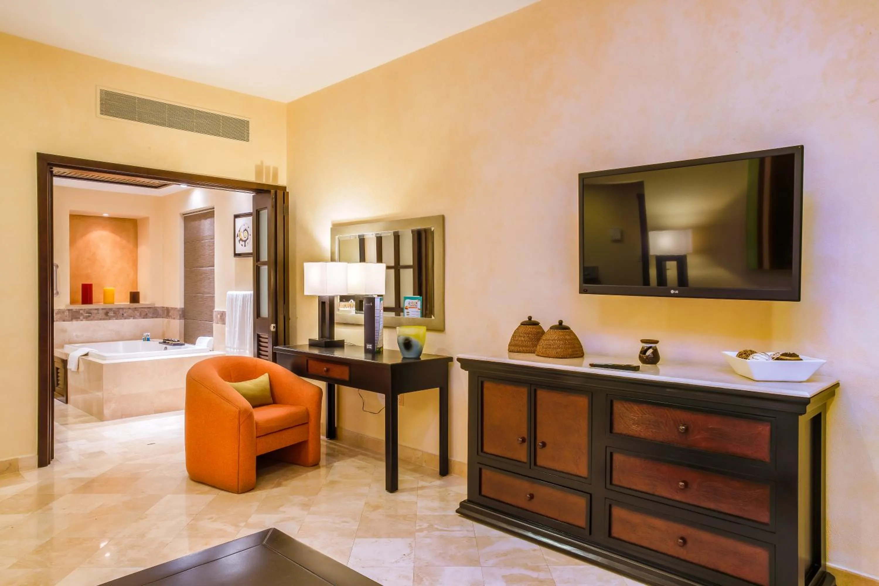 Living room, Bed in Garza Blanca Preserve Resort & Spa