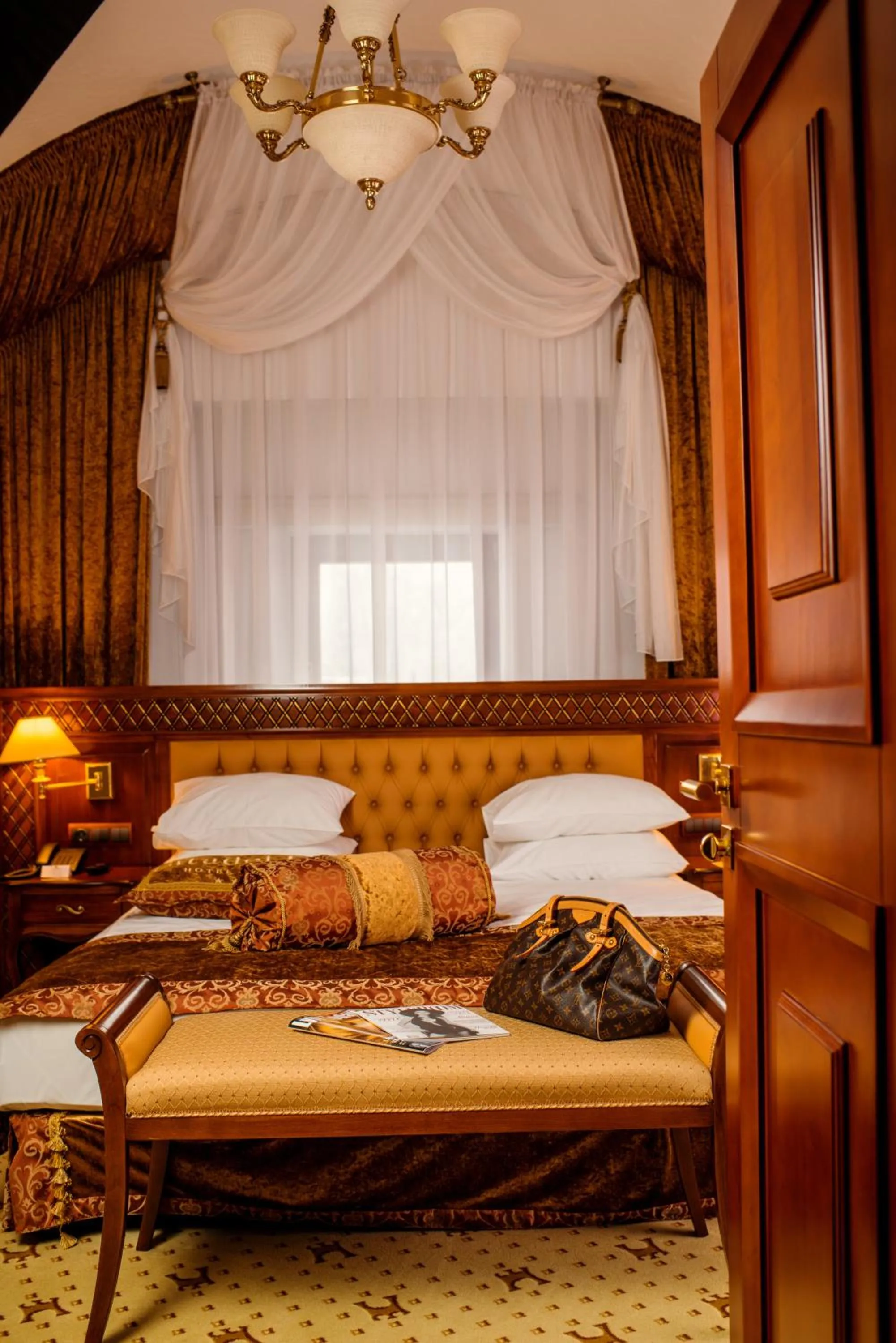 Decorative detail, Bed in Citadel Inn Gastro Boutique Hotel - Готель Цитадель Львів