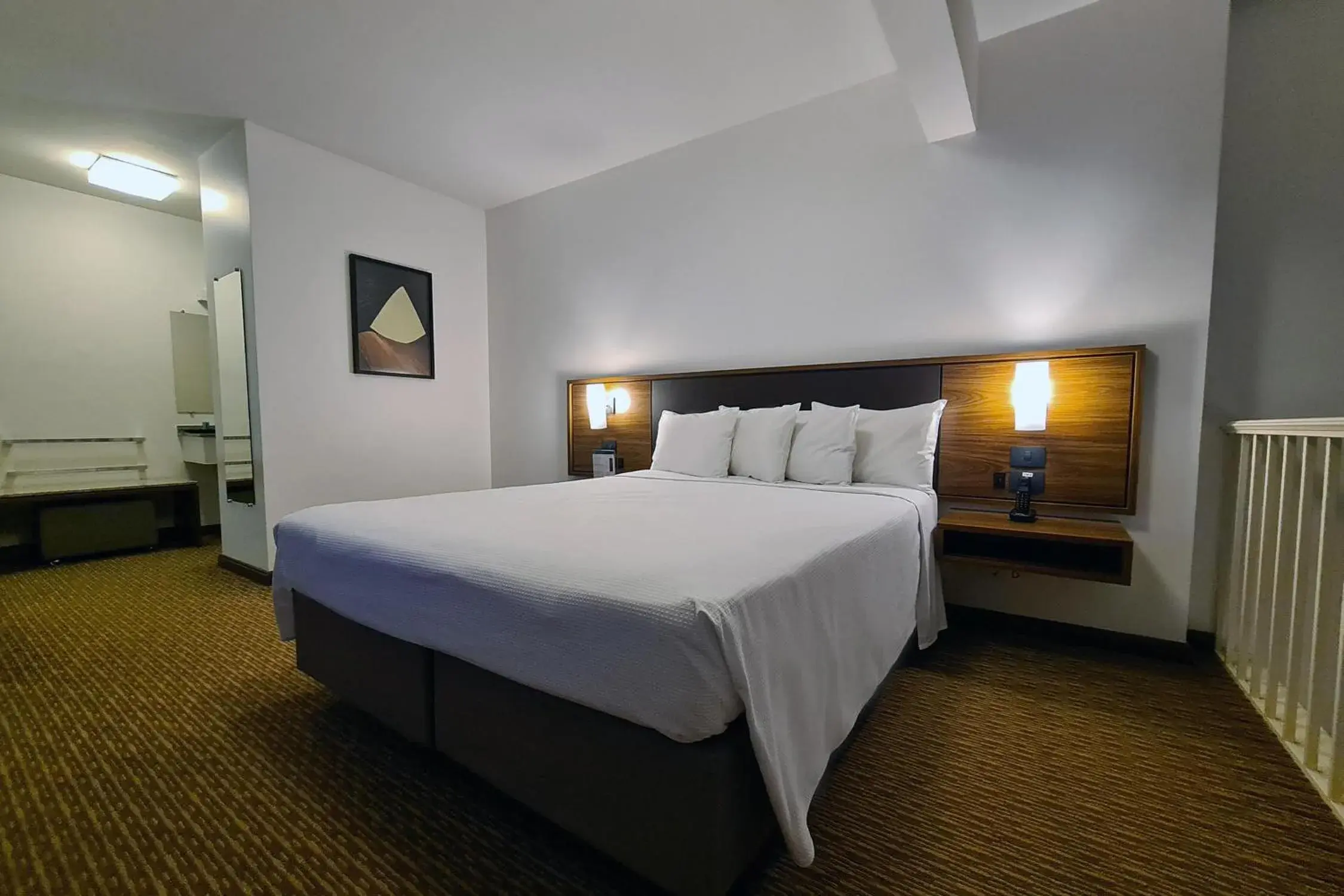 Bed in Hotel Deville Curitiba Bed in Hotel Deville Curitiba