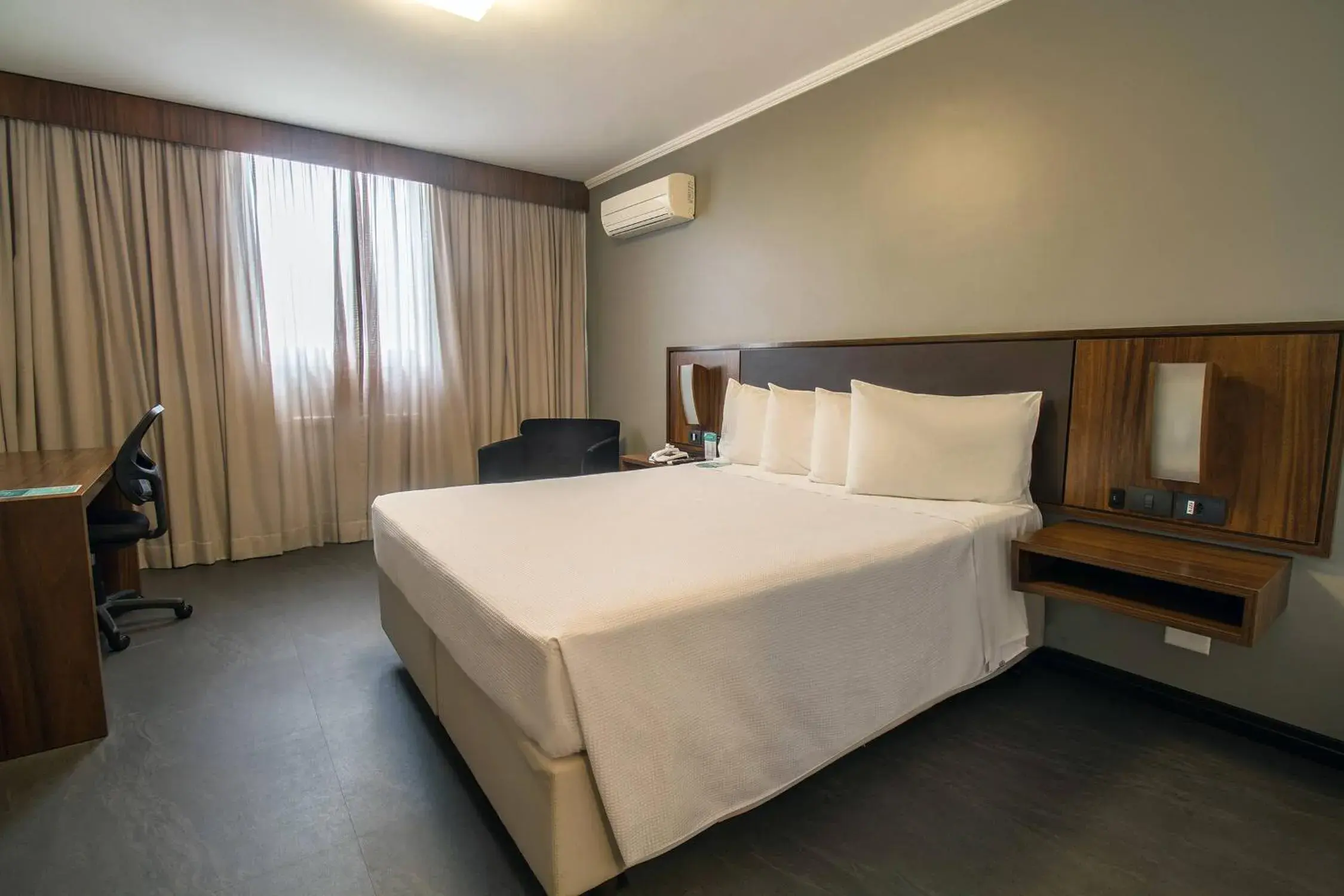 Bed in Hotel Deville Curitiba Bed in Hotel Deville Curitiba