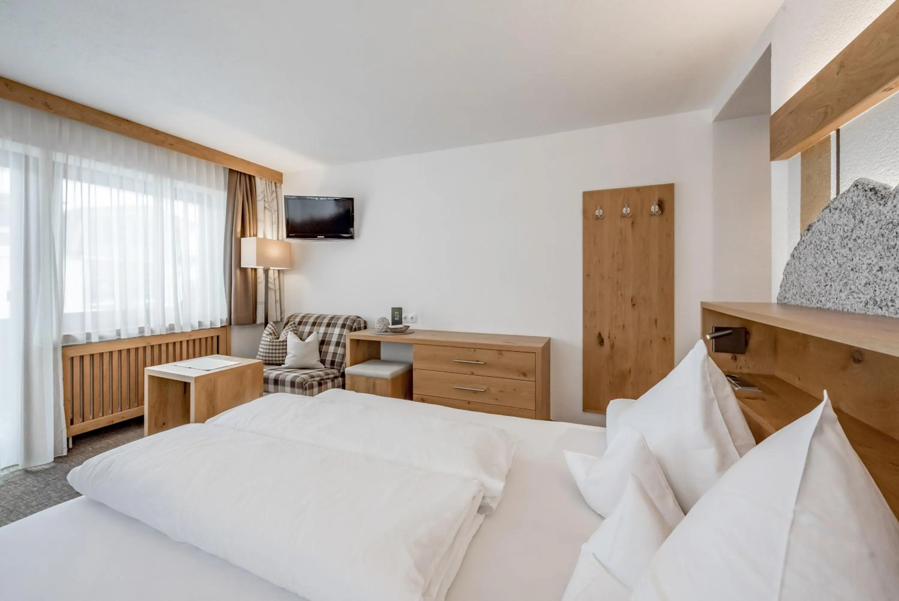 Bed in Hotel Sportpension Carinthia