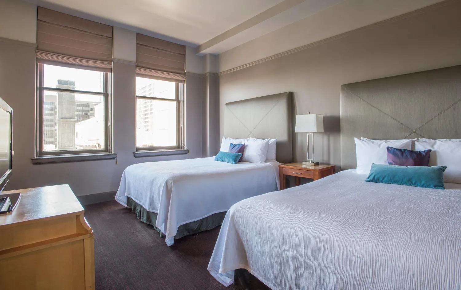 Bed in Magnolia Hotel Downtown Dallas