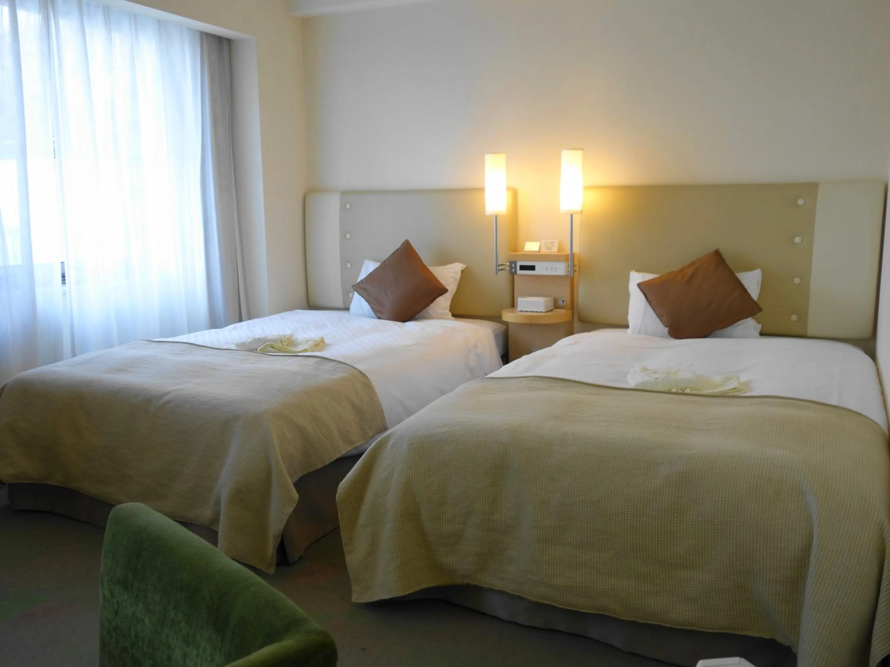 Bed in City Plaza Osaka