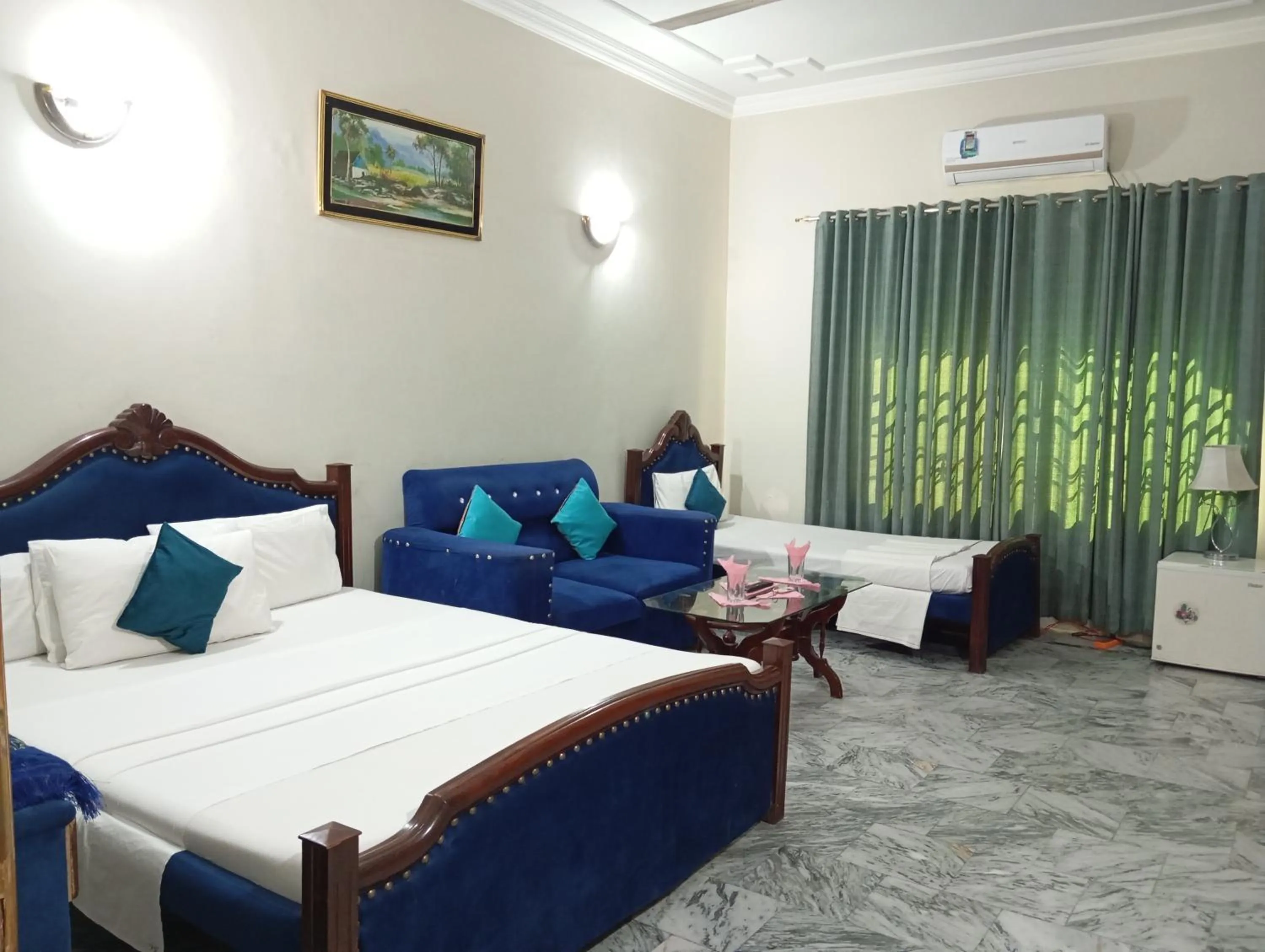 Bed in Orion International Guest House