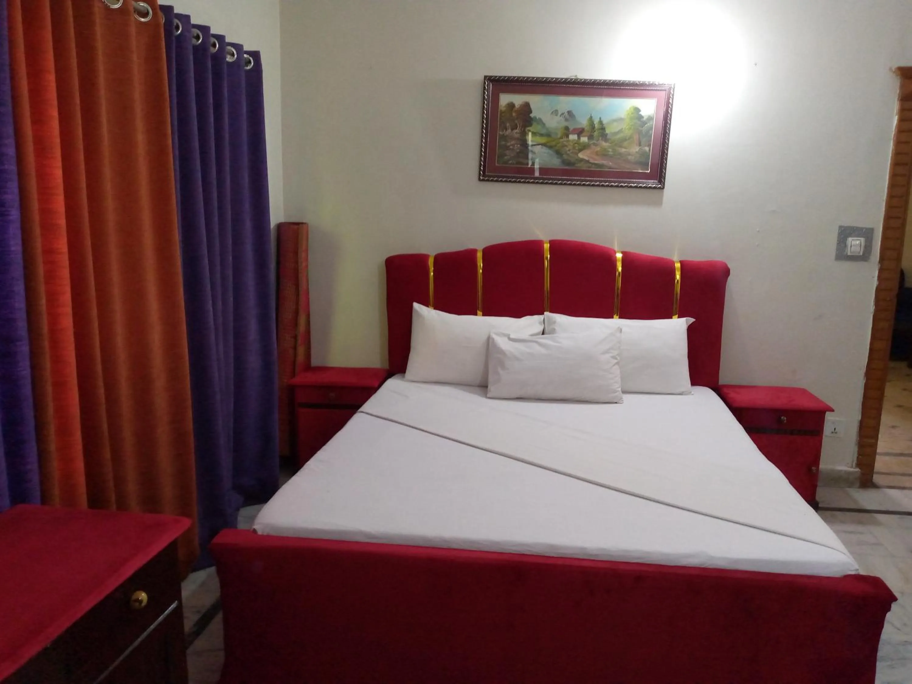 Bed in Orion International Guest House