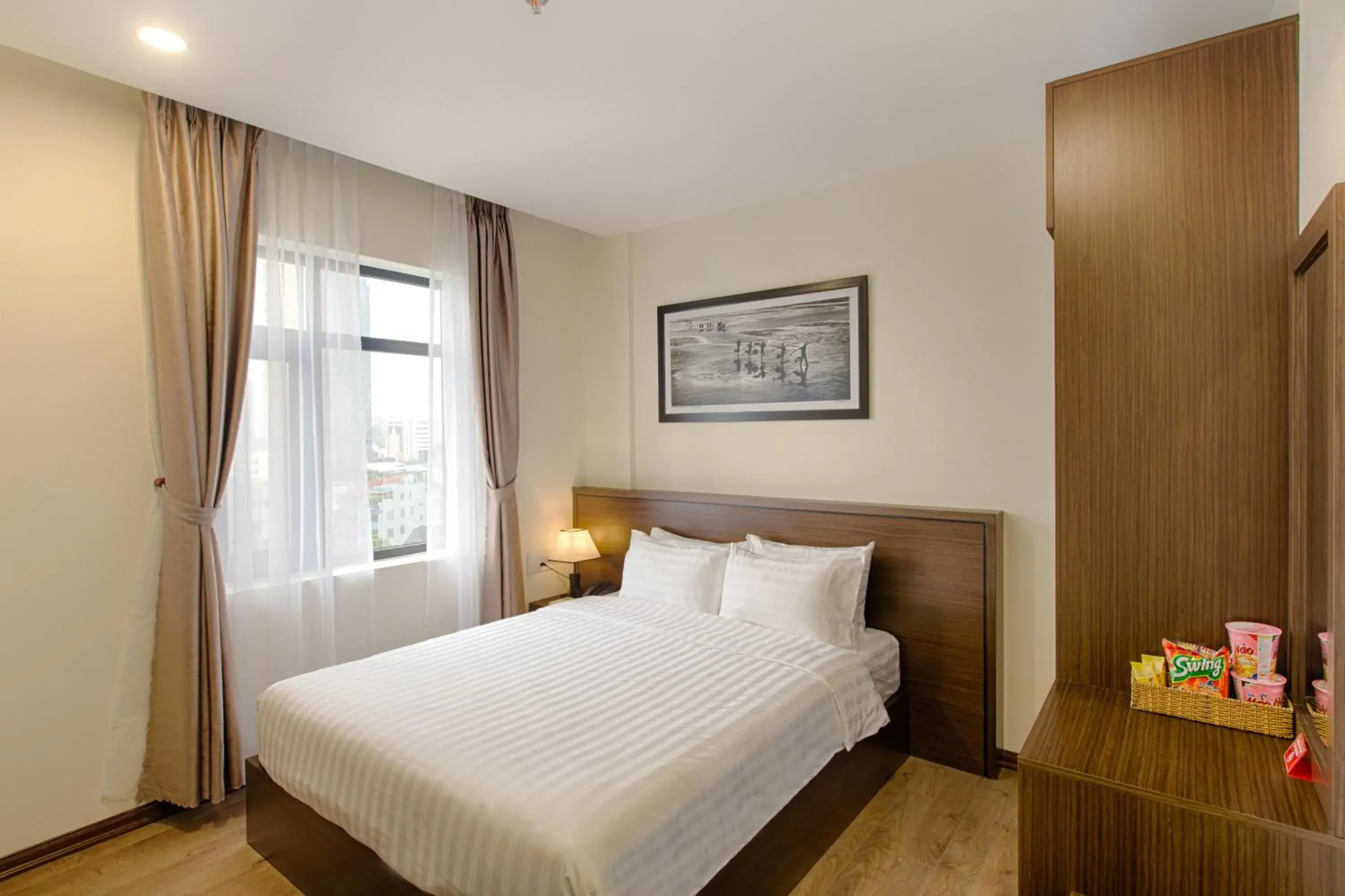 Bed in Central Hotel & Spa Danang Bed in Central Hotel & Spa Danang