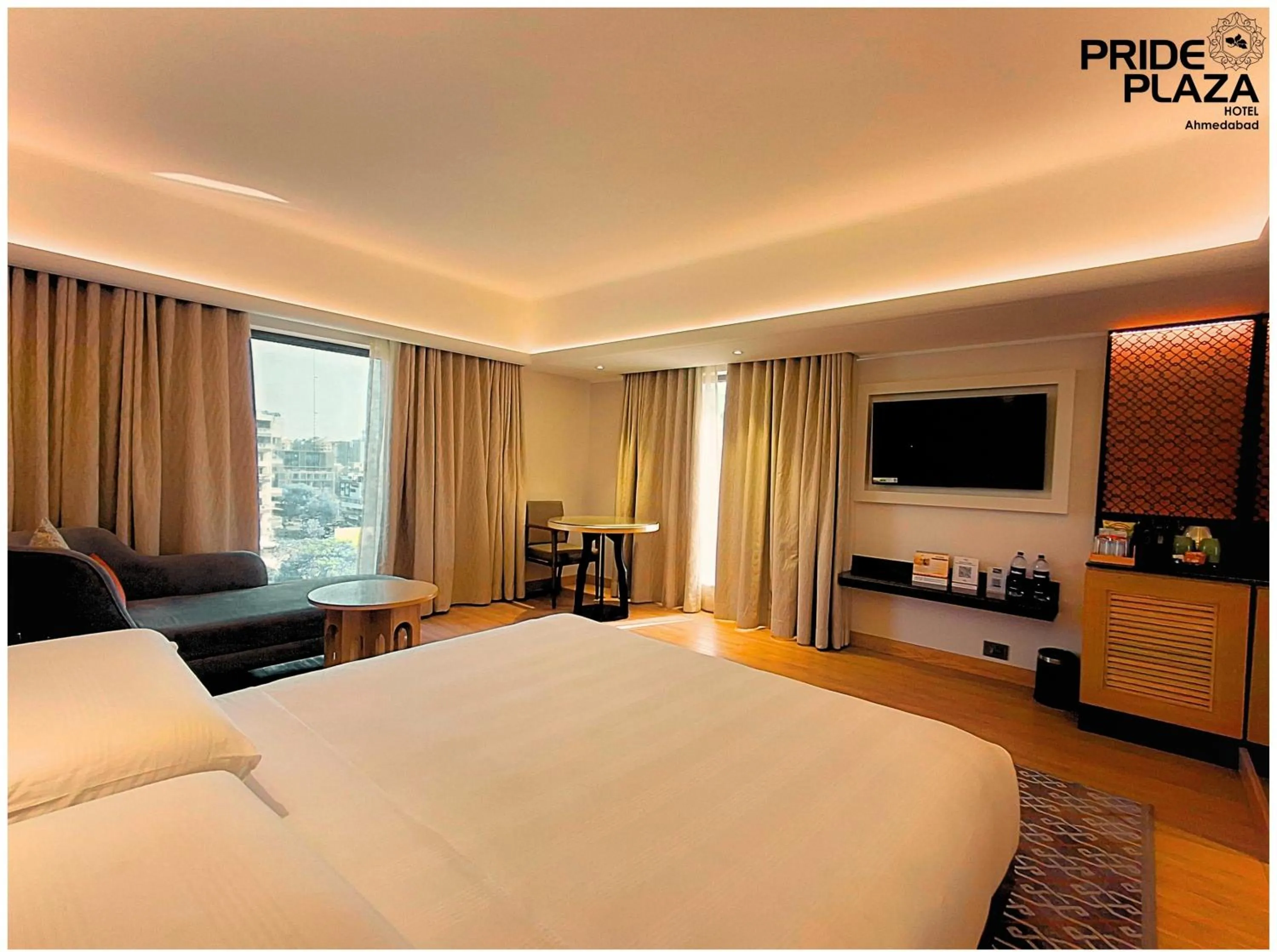 Bed in Pride Plaza Hotel, Ahmedabad