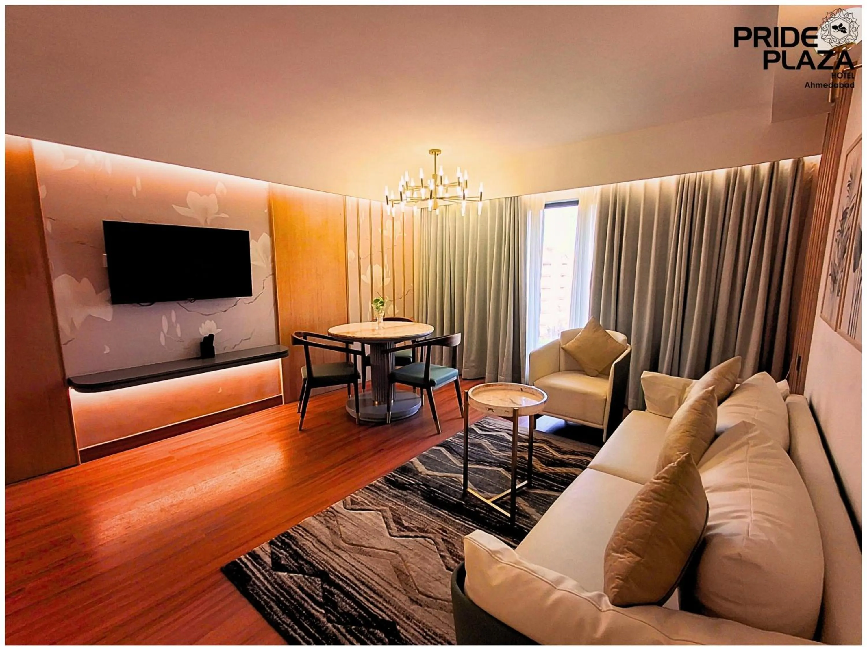 Communal lounge/ TV room in Pride Plaza Hotel, Ahmedabad