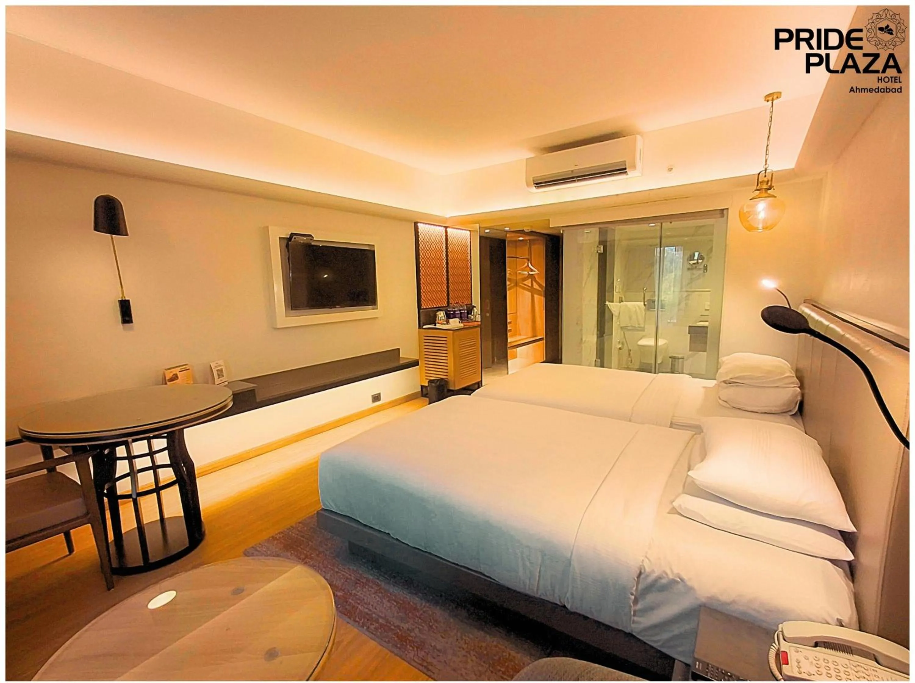 Bed in Pride Plaza Hotel, Ahmedabad