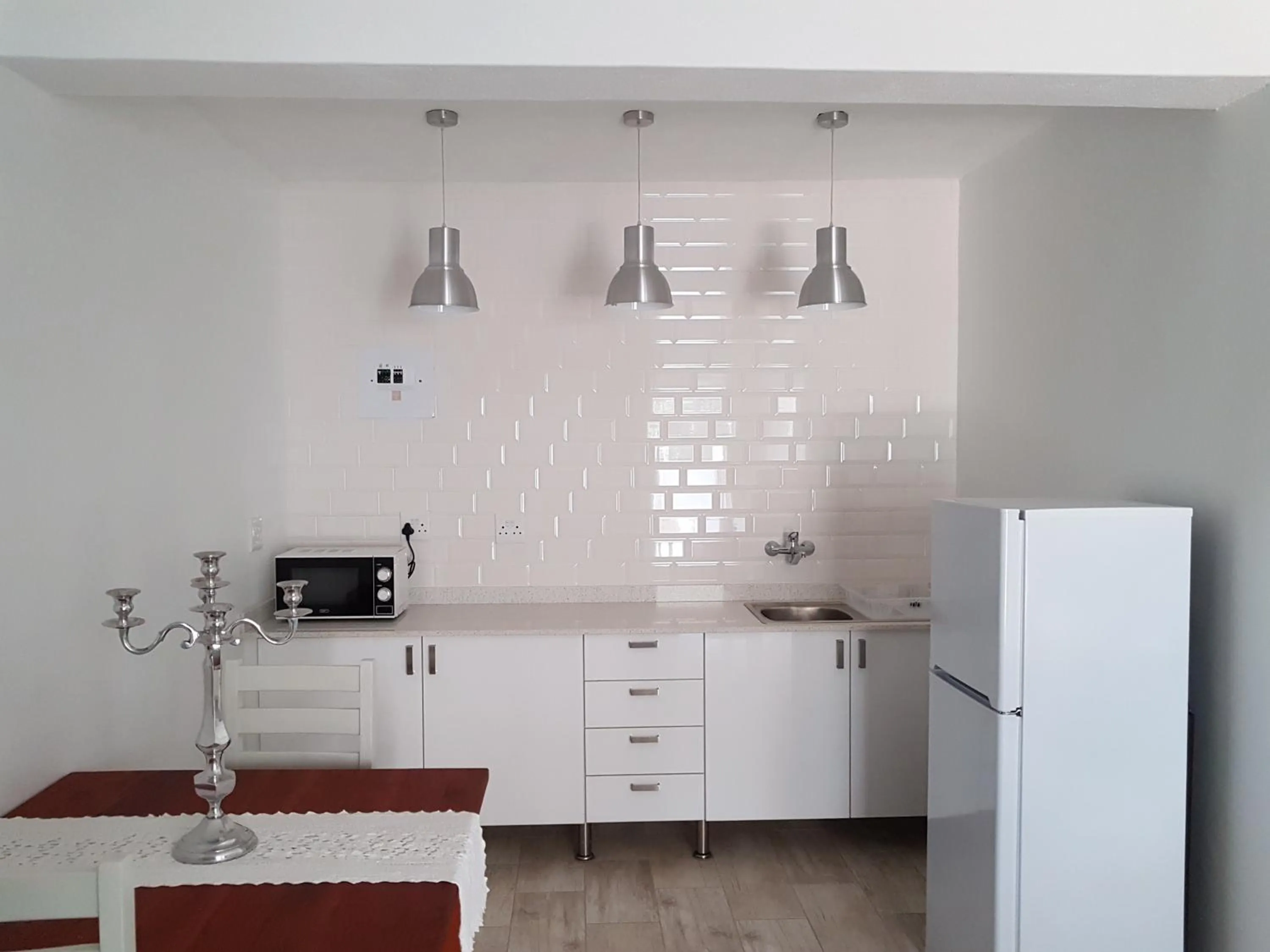 Kitchen or kitchenette in Be Our Guest Self Catering