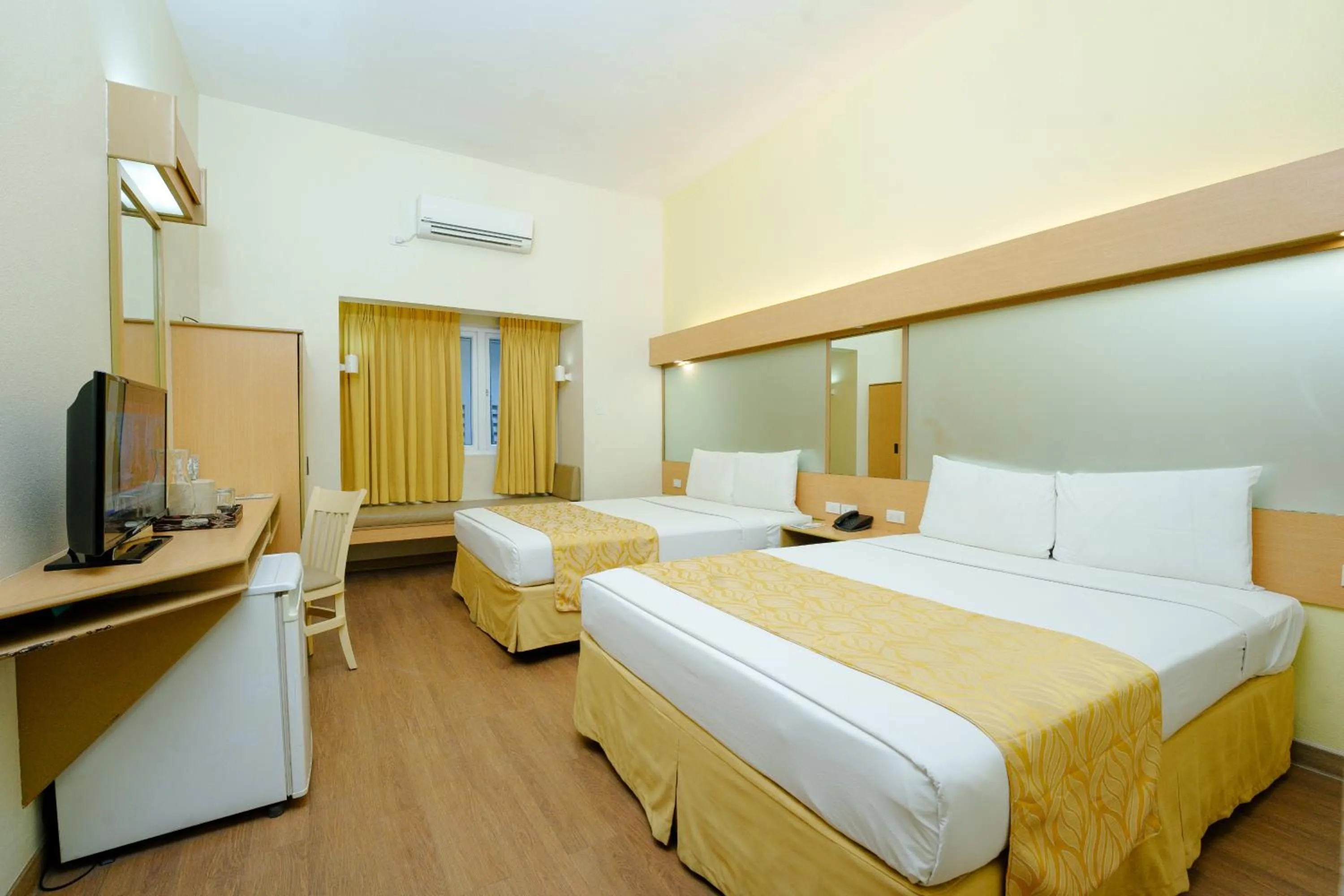 Bed in Microtel by Wyndham Davao