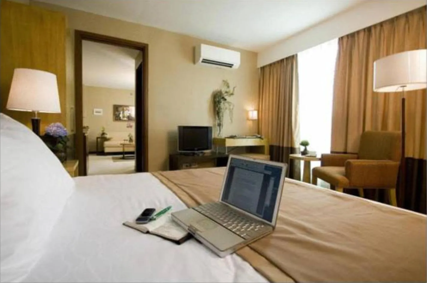 Photo of the whole room, Bed in One Tagaytay Place Hotel Suites OFFICIAL ACCOUNT