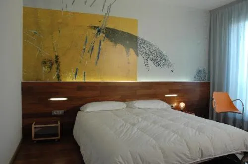 Bed in Alloggi Taverna Caorlina