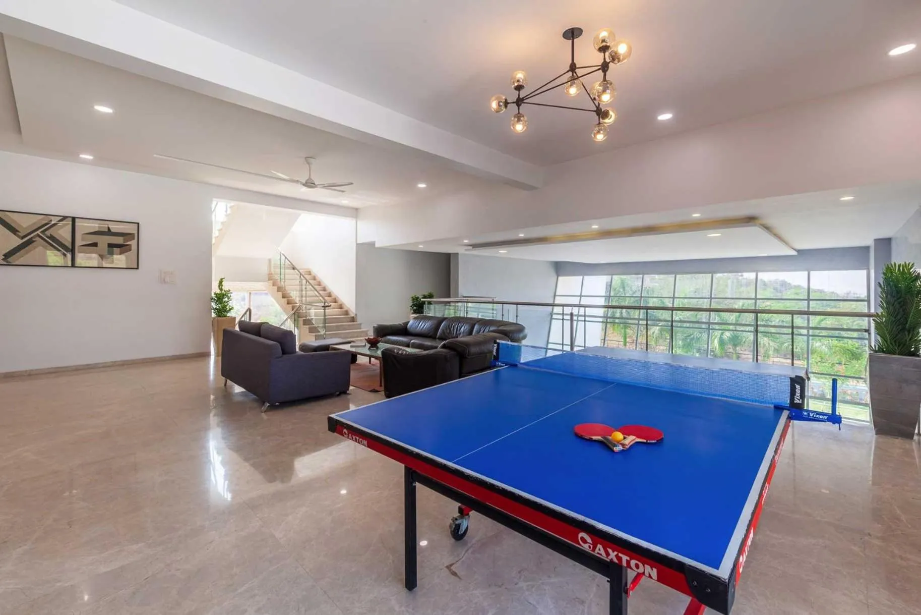 StayVista's White Pebbles - A Villa with Theater Room & Swimming Pool