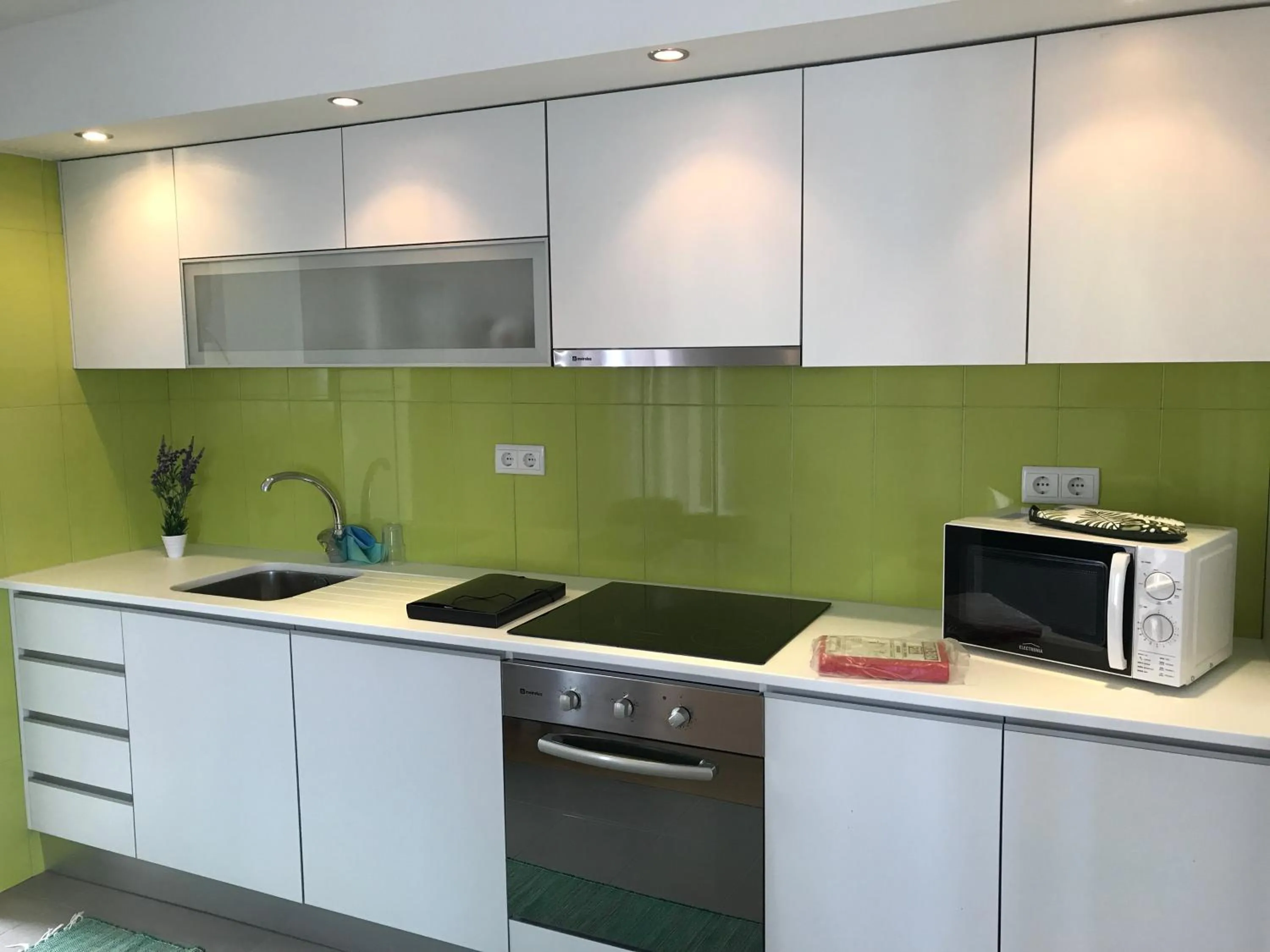 Kitchen or kitchenette in Apartamentos Solmar 15º