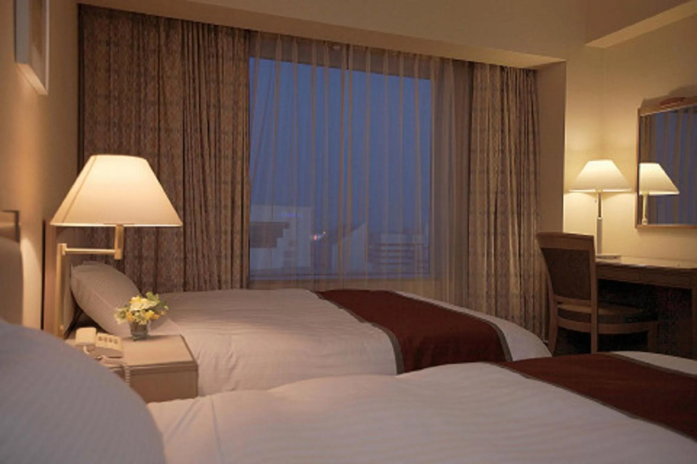 Photo of the whole room, Bed in Miyako Hotel Yokkaichi