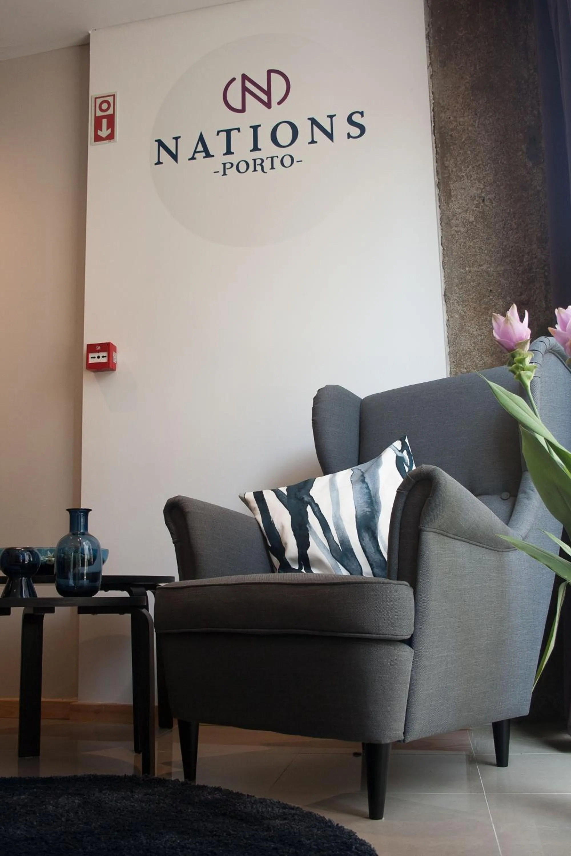 Property logo or sign in Nations Porto - Studios & Suites